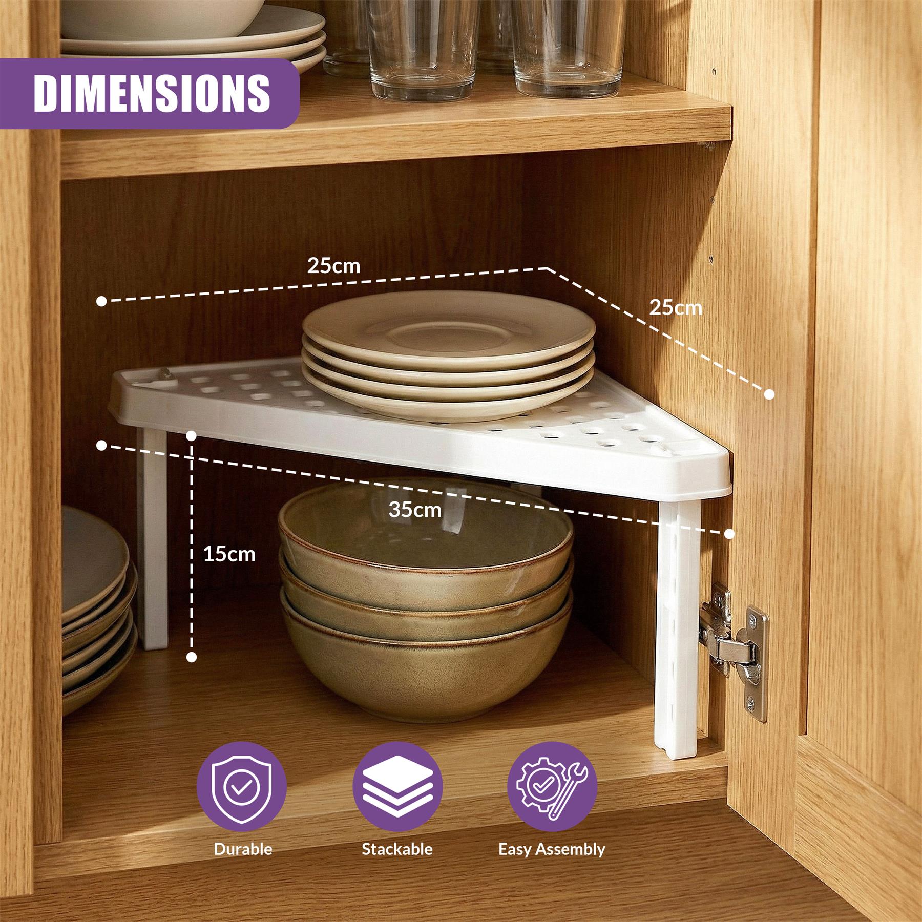 Angled white shelf unit inserted into a cabinet, holding stacked plates and bowls.