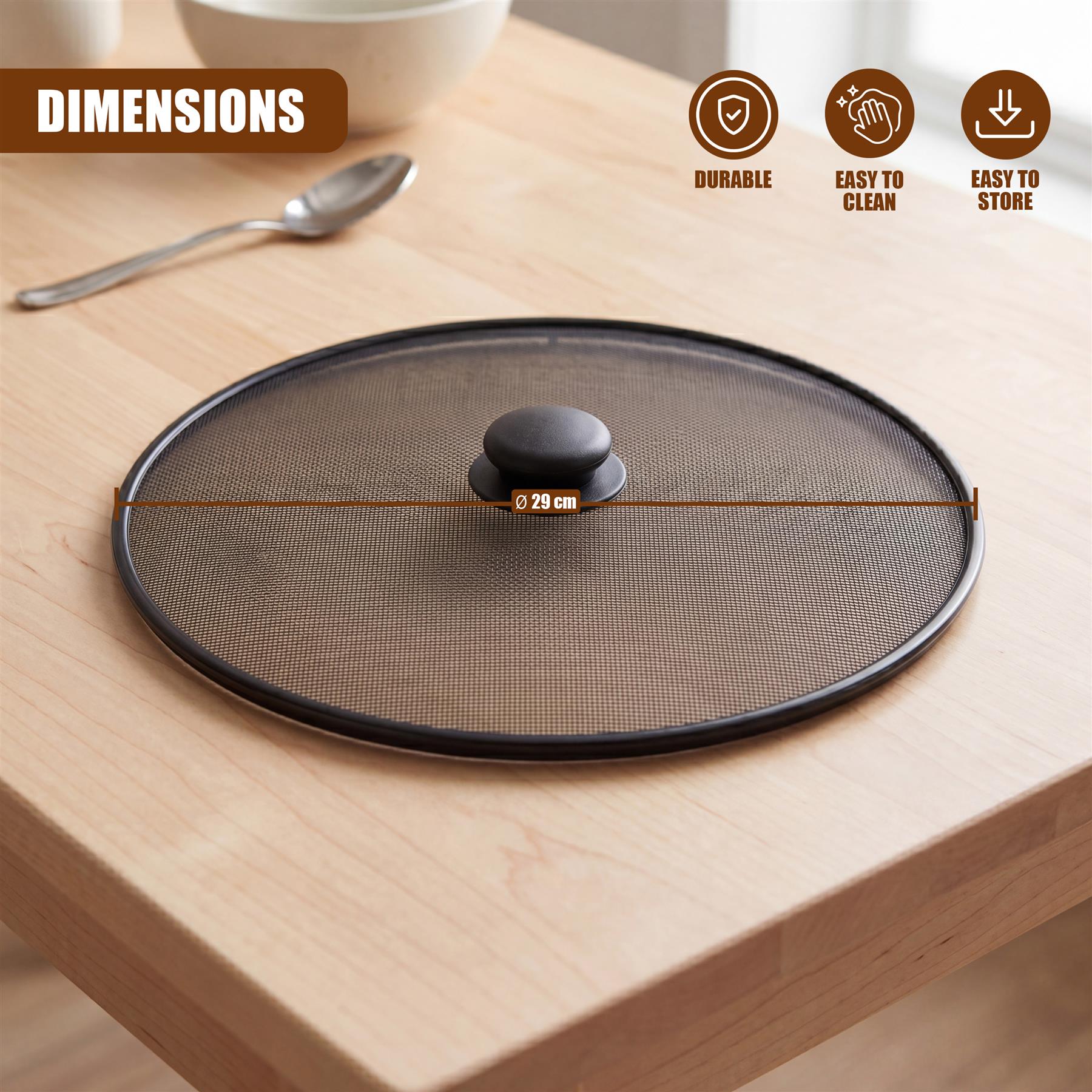 Black circular mesh screen measuring 29 cm, resting on a light wooden surface.