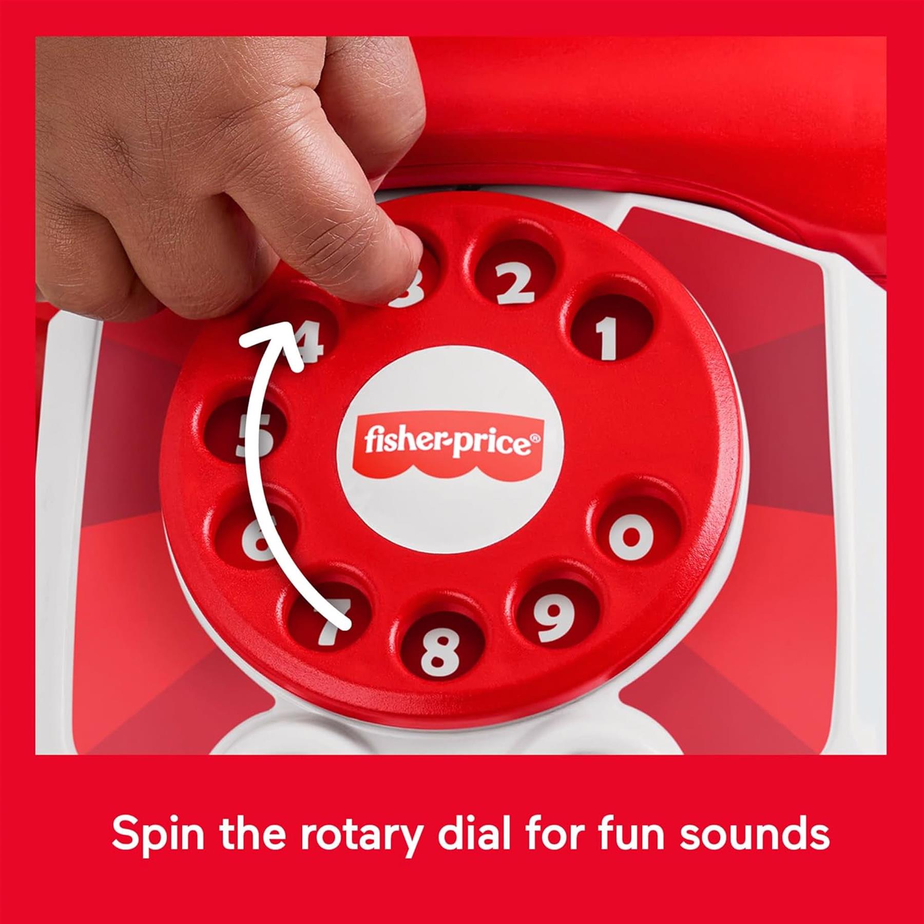 Close-up view of a hand turning the red rotary dial on the Fisher-Price toy telephone.