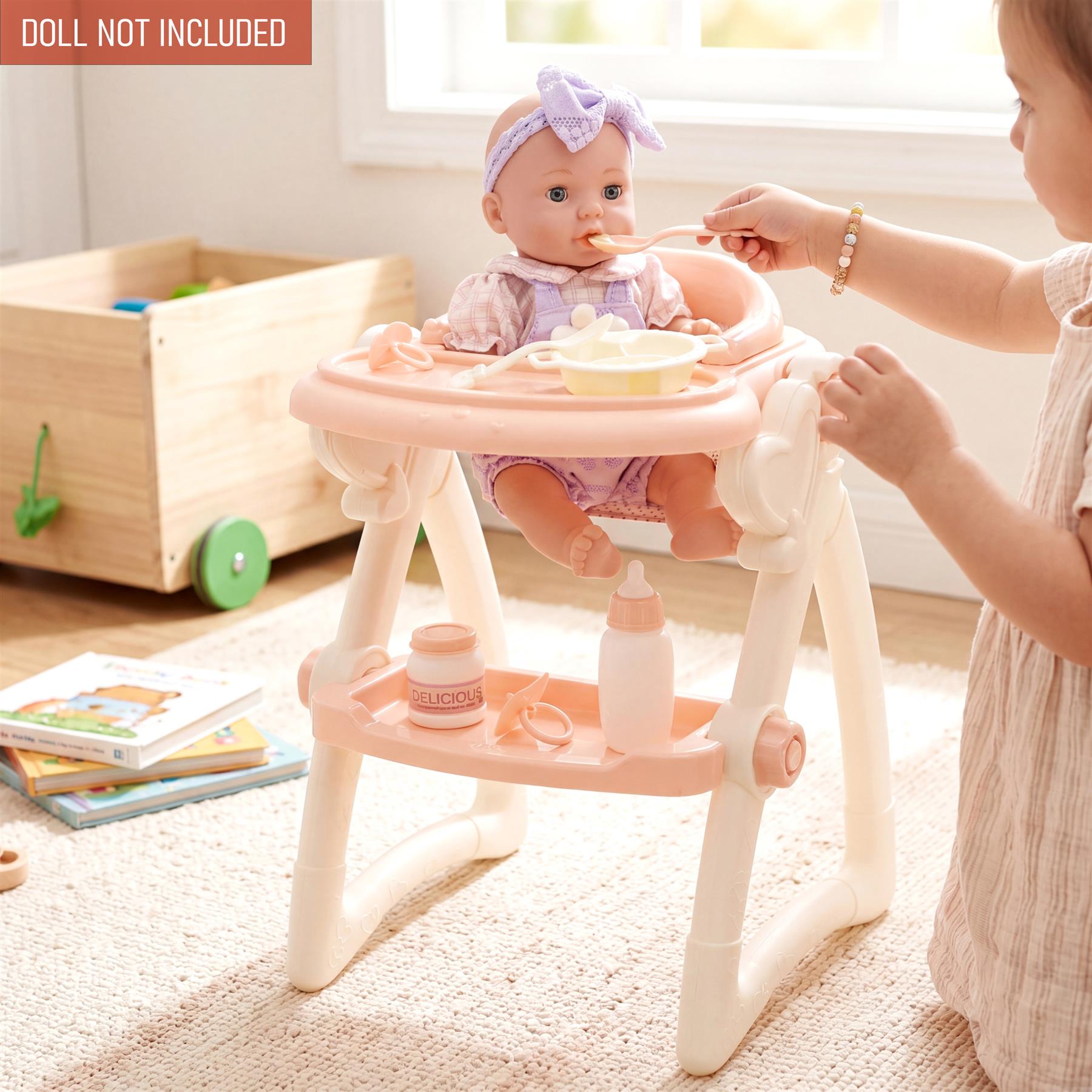 Doll high chair features a tray, bottle, and feeding accessories for pretend play.