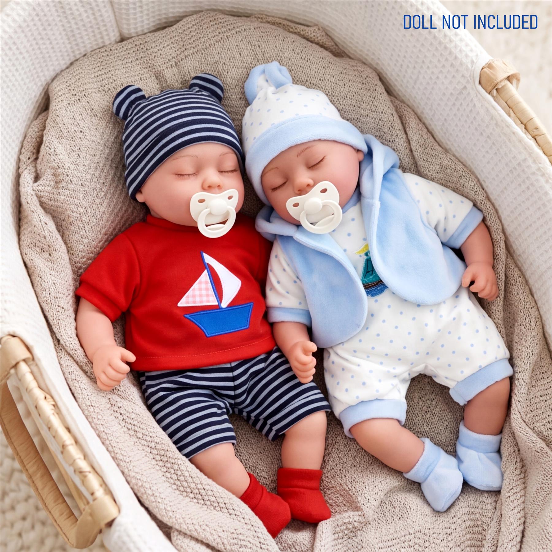 Set of two coordinated baby outfits shown on sleeping dolls, featuring red and blue stripes and dots.