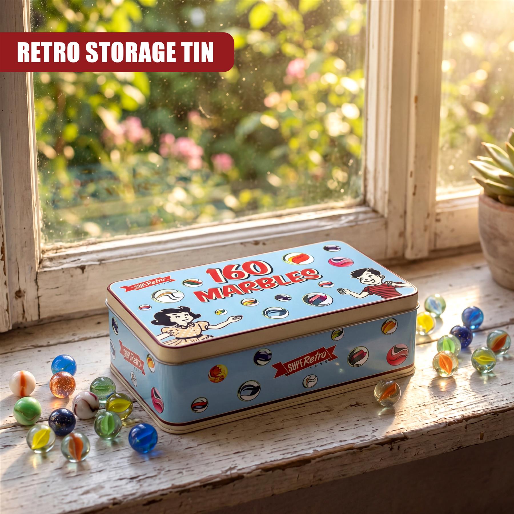 Blue metal tin box marked "160 Marbles" displayed on a sill with scattered glass marbles.