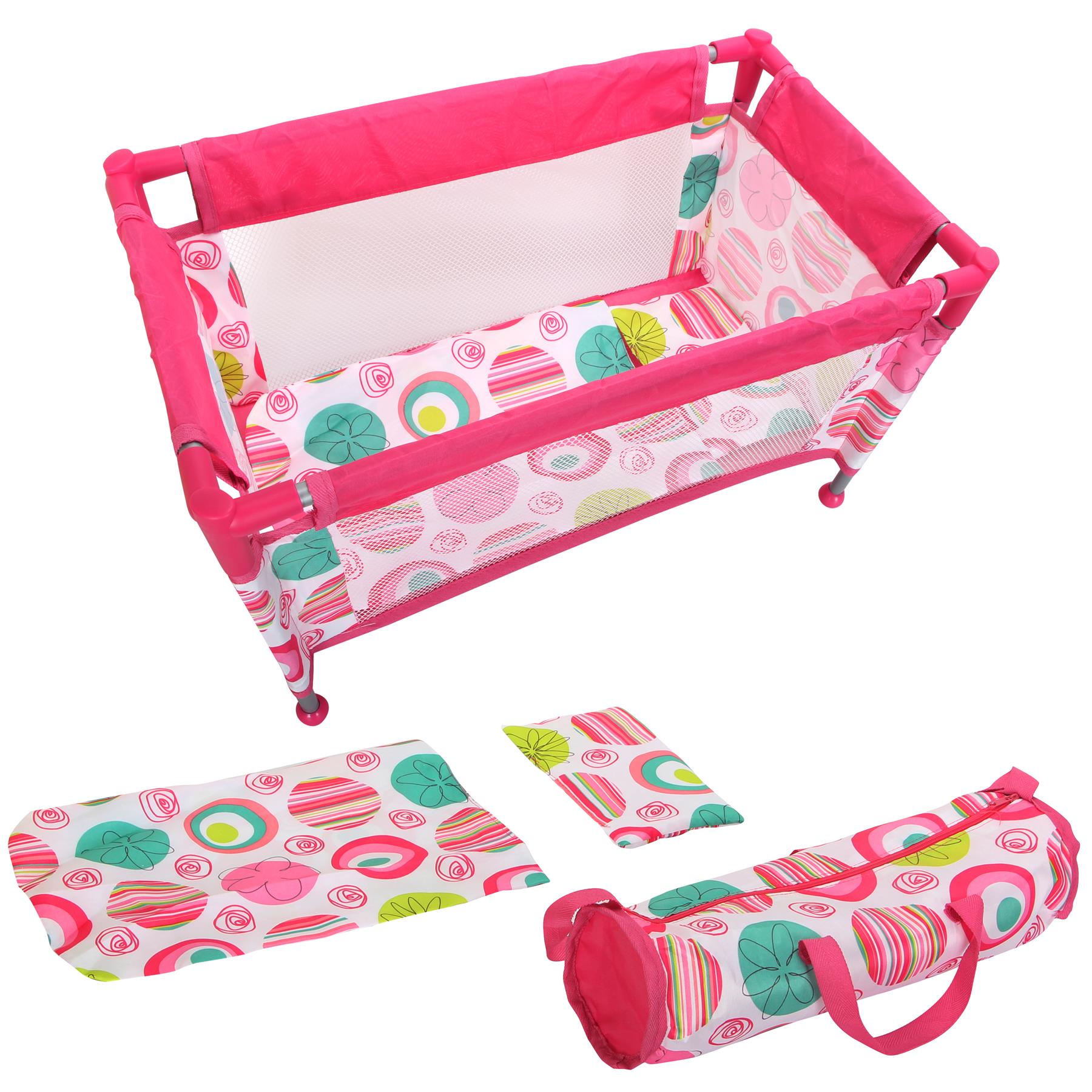 This image features a pink and white baby bassinet, a carry bag, and a set of matching accessories including a changing pad and footrests. - The Magic Toy Shop