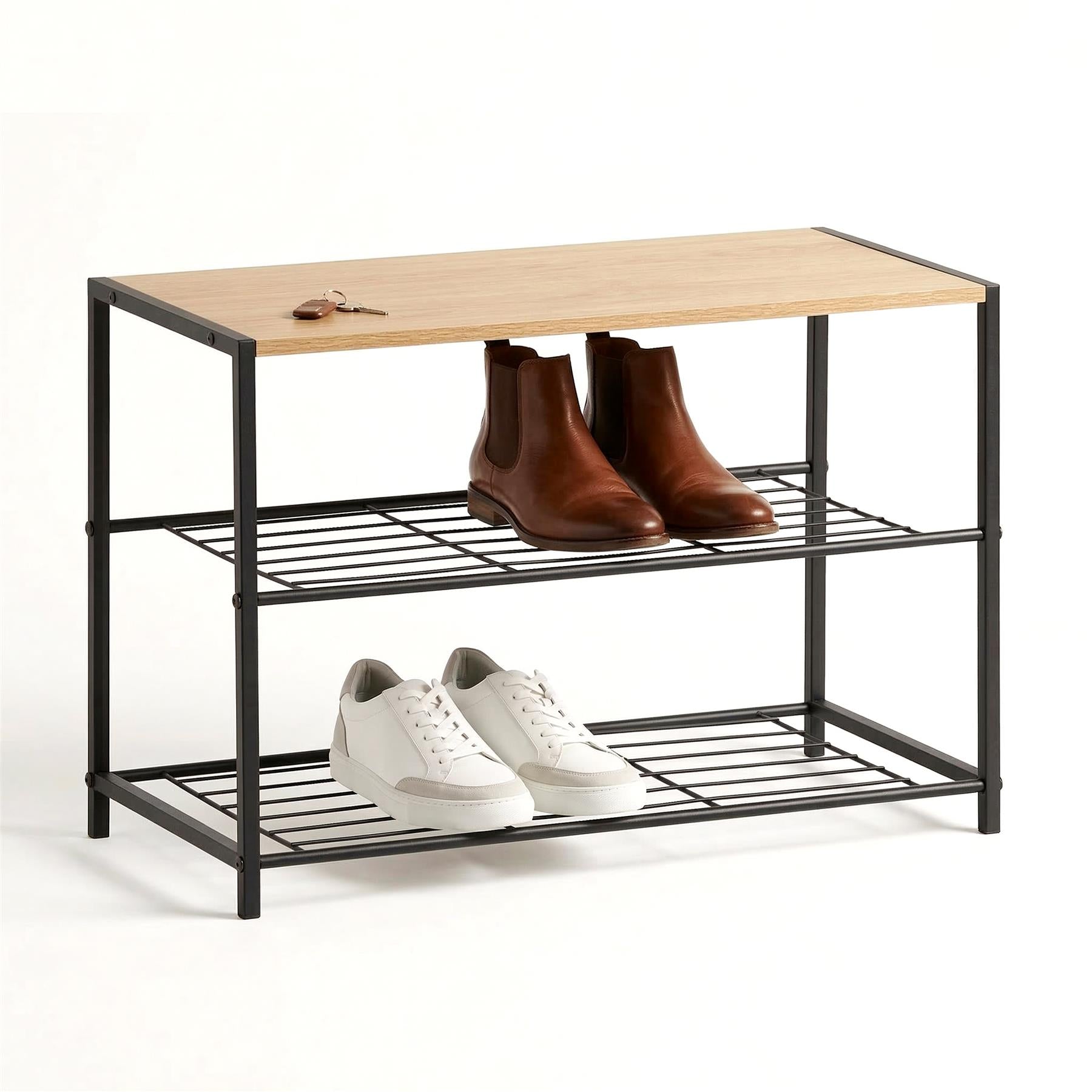 Two-tiered black shoe rack displaying brown ankle boots and pairs of white sneakers.