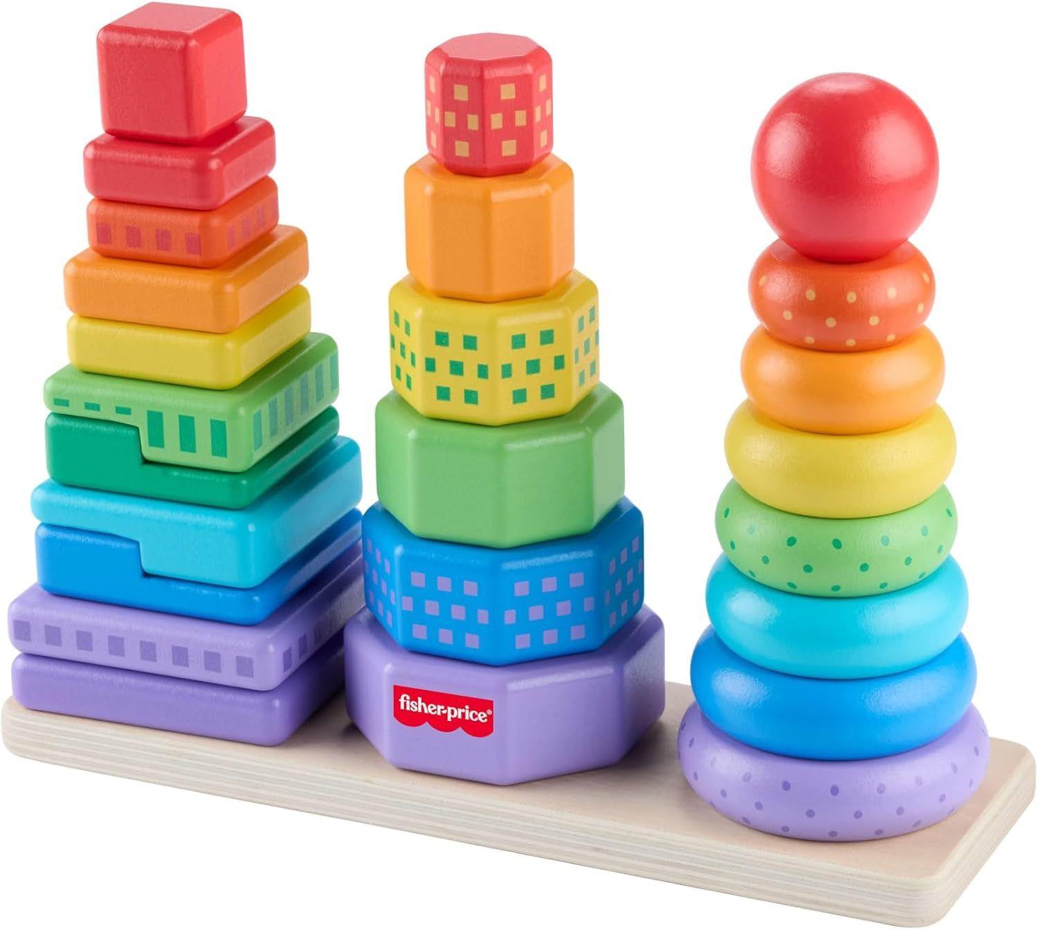 Three wooden stacking toys showing colored squares, patterned cubes, and rings.