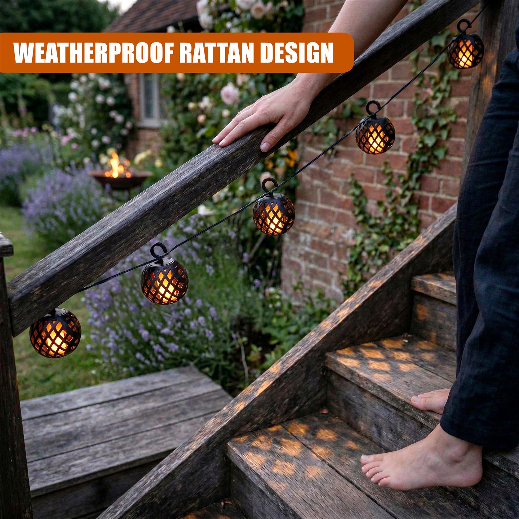 Rattan bulb solar lights strung along a rustic wooden railing of an outdoor staircase.