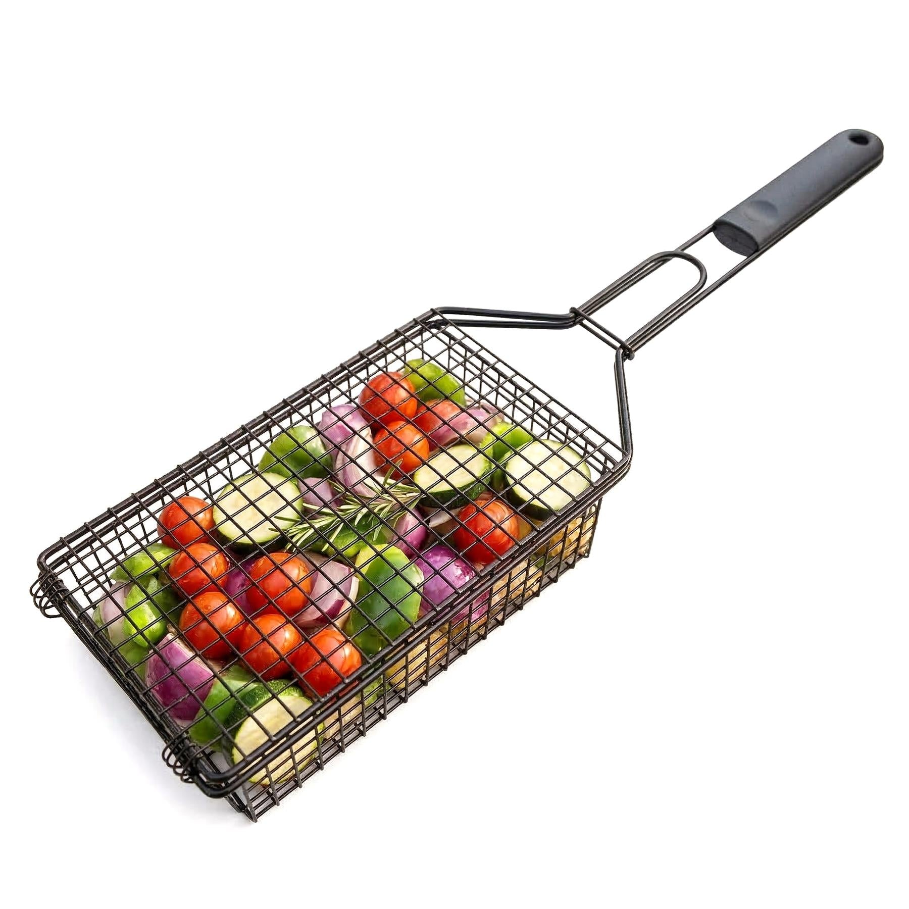 Deep metal grilling basket filled with mixed vegetables, held by an attached long handle.