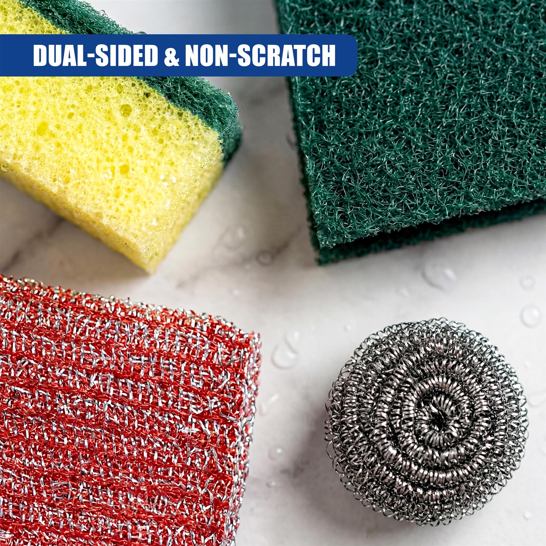 Yellow sponge, green scouring pad, and red scouring pad displayed on a white marble surface.