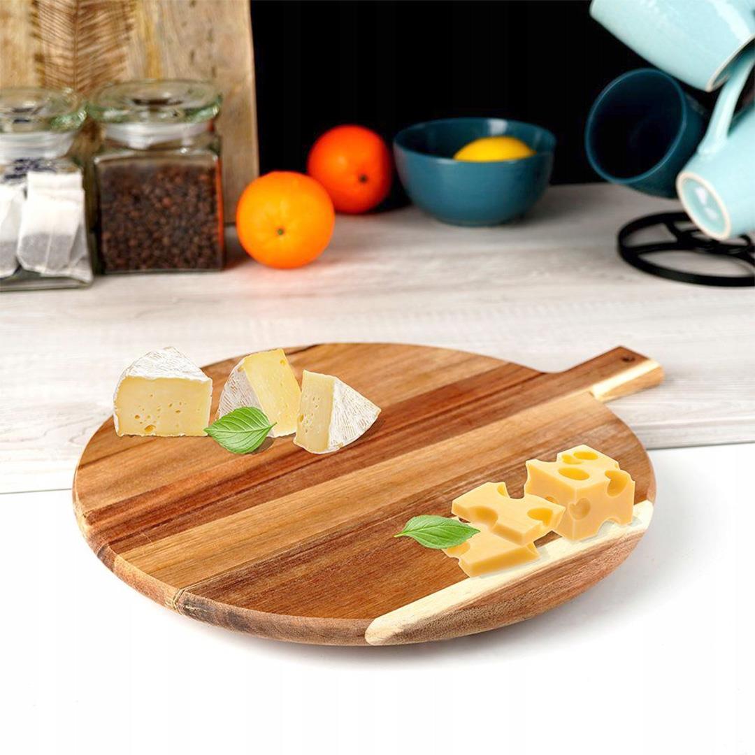 A wooden cutting board with a handle, featuring a cheese and fruit arrangement. - The Magic Toy Shop