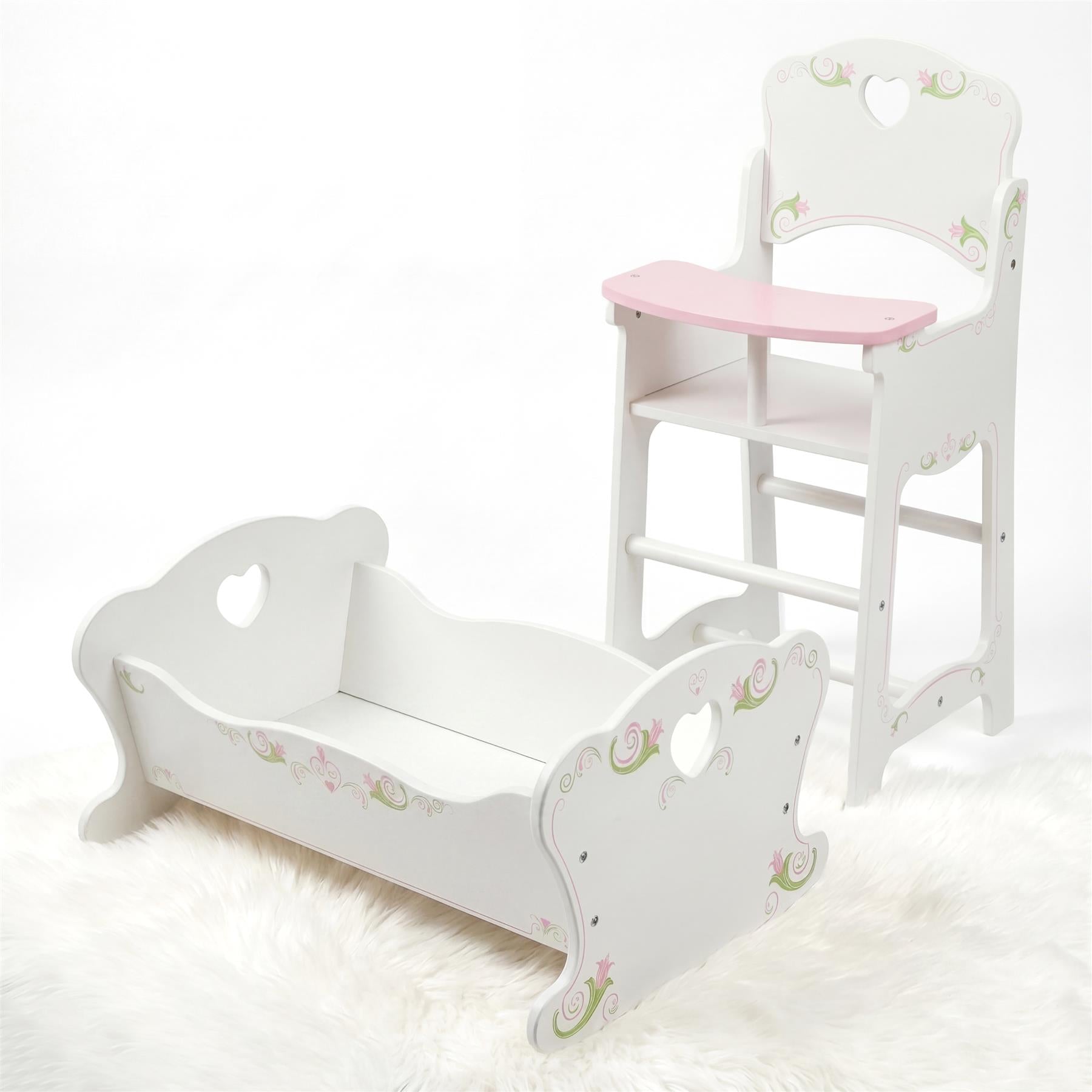 White wooden cradle and high chair set featuring pink accents and delicate floral decorative decals.