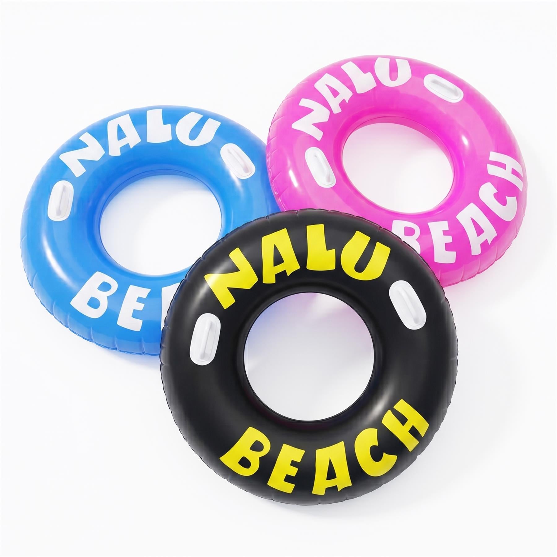 Three inflatable tire rings in blue, pink, and black. Each ring features yellow lettering that reads "Nalu Beach."
