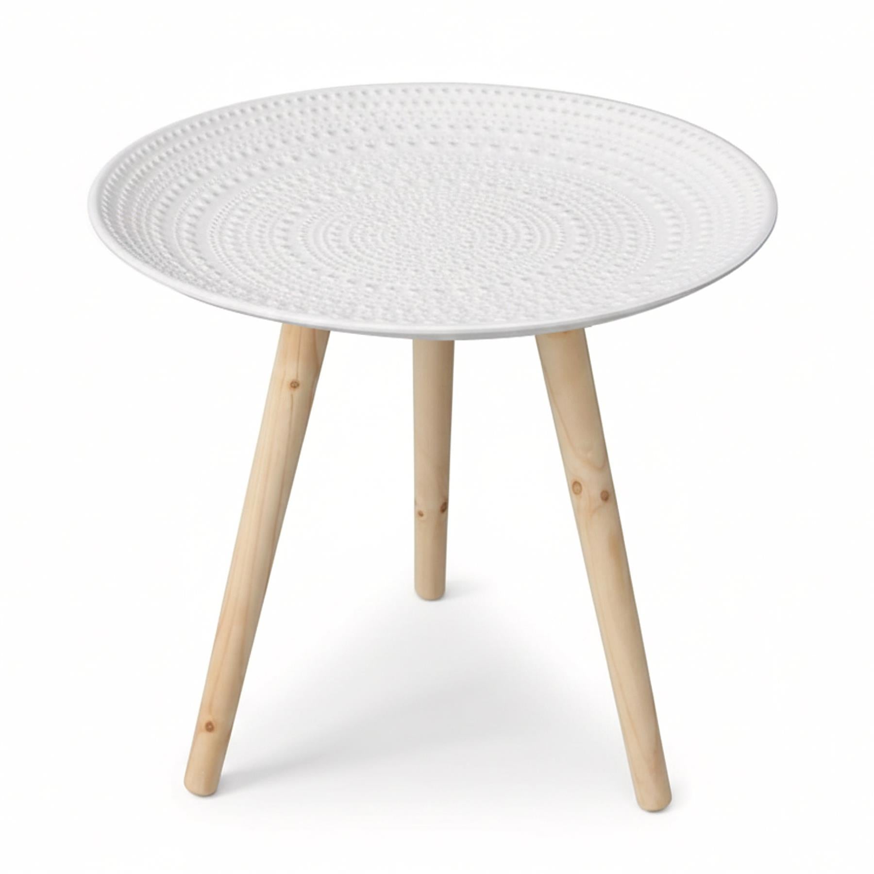 Round white side table with a textured top and three tapered natural wood legs.