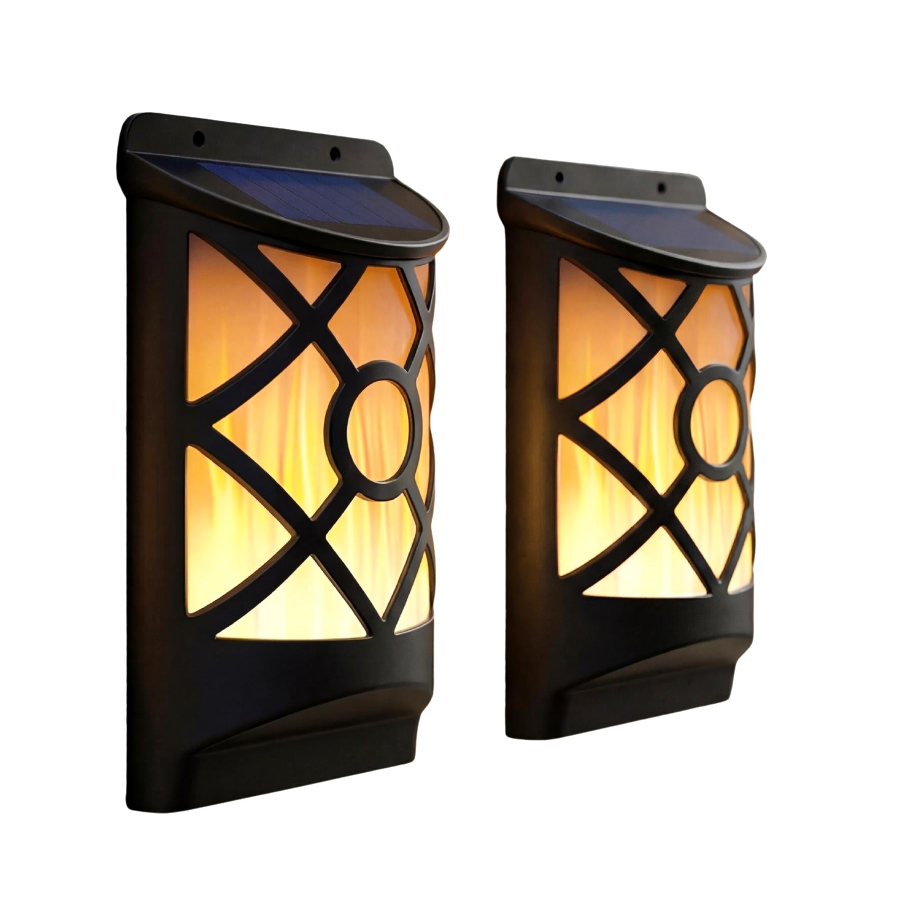 Pair of black outdoor wall lanterns featuring decorative lattice work and glowing orange simulated flames.