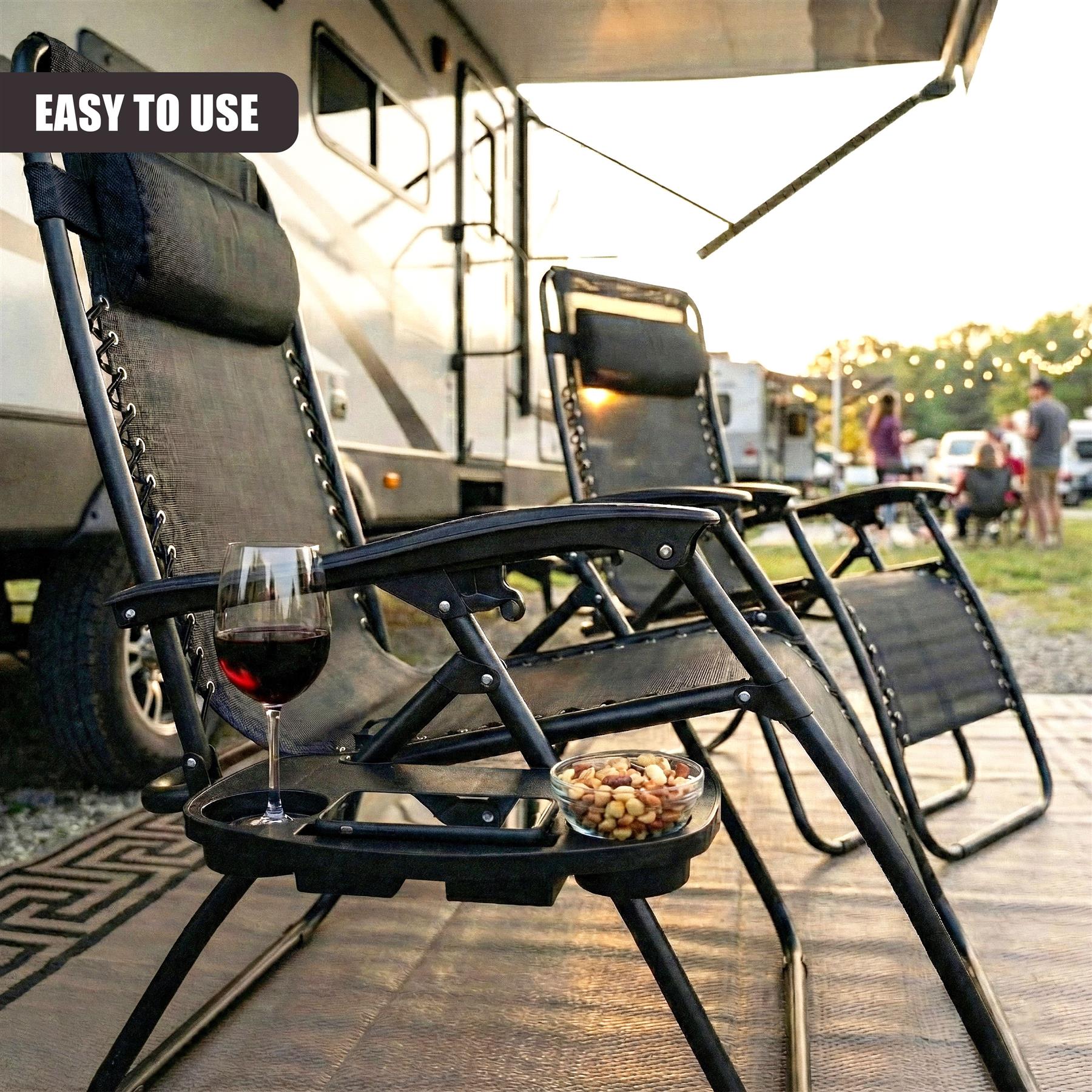 A camping chair with a built-in tray, featuring a cup holder, phone holder, and storage compartment. It has a comfortable, adjustable design with a reclining mechanism and a carrying handle. The chair is made of durable, weather-resistant materials and has a sturdy frame. It is suitable for camping, picnics, and outdoor events. - The Magic Toy Shop