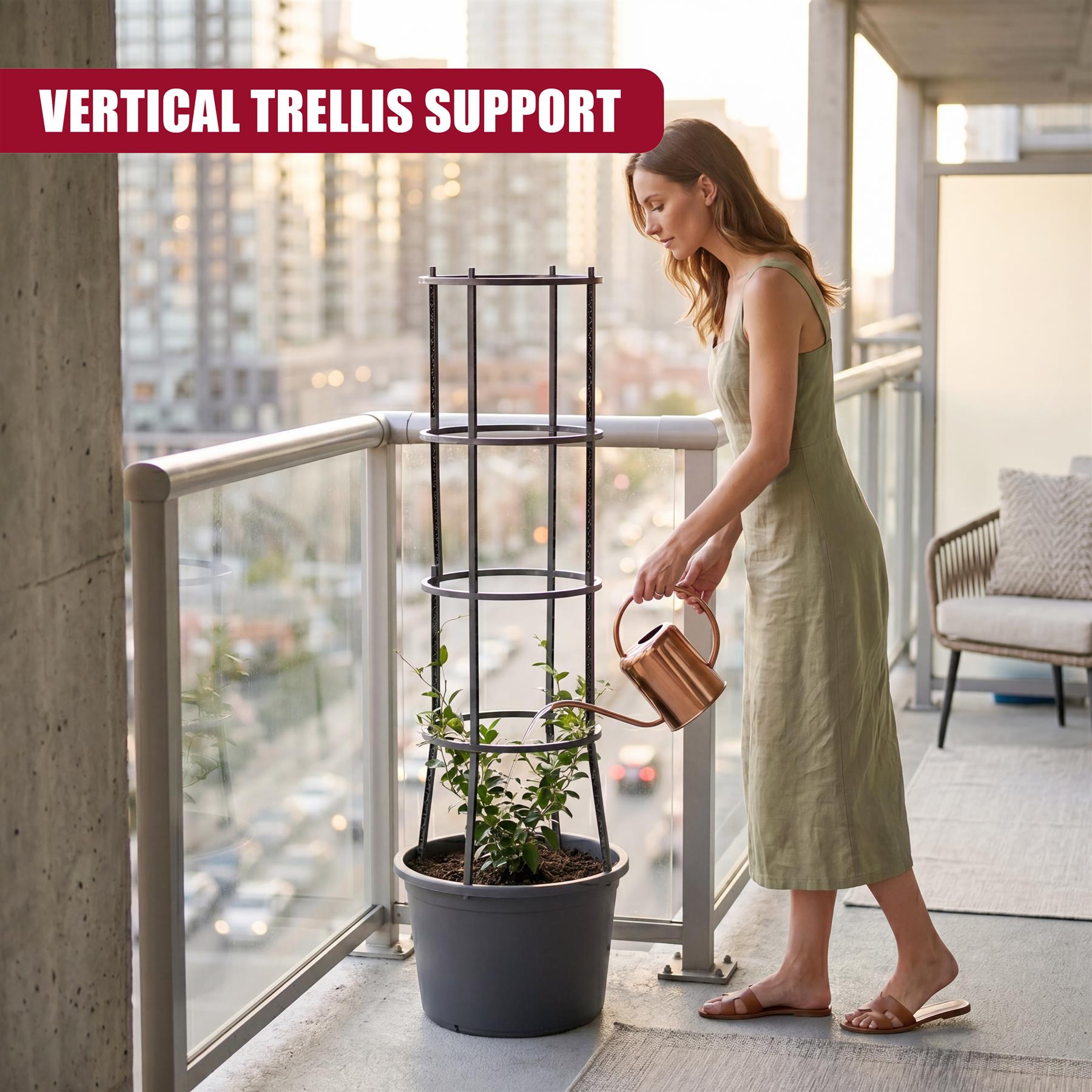 Black metal vertical trellis support holding green plants in a large gray container.