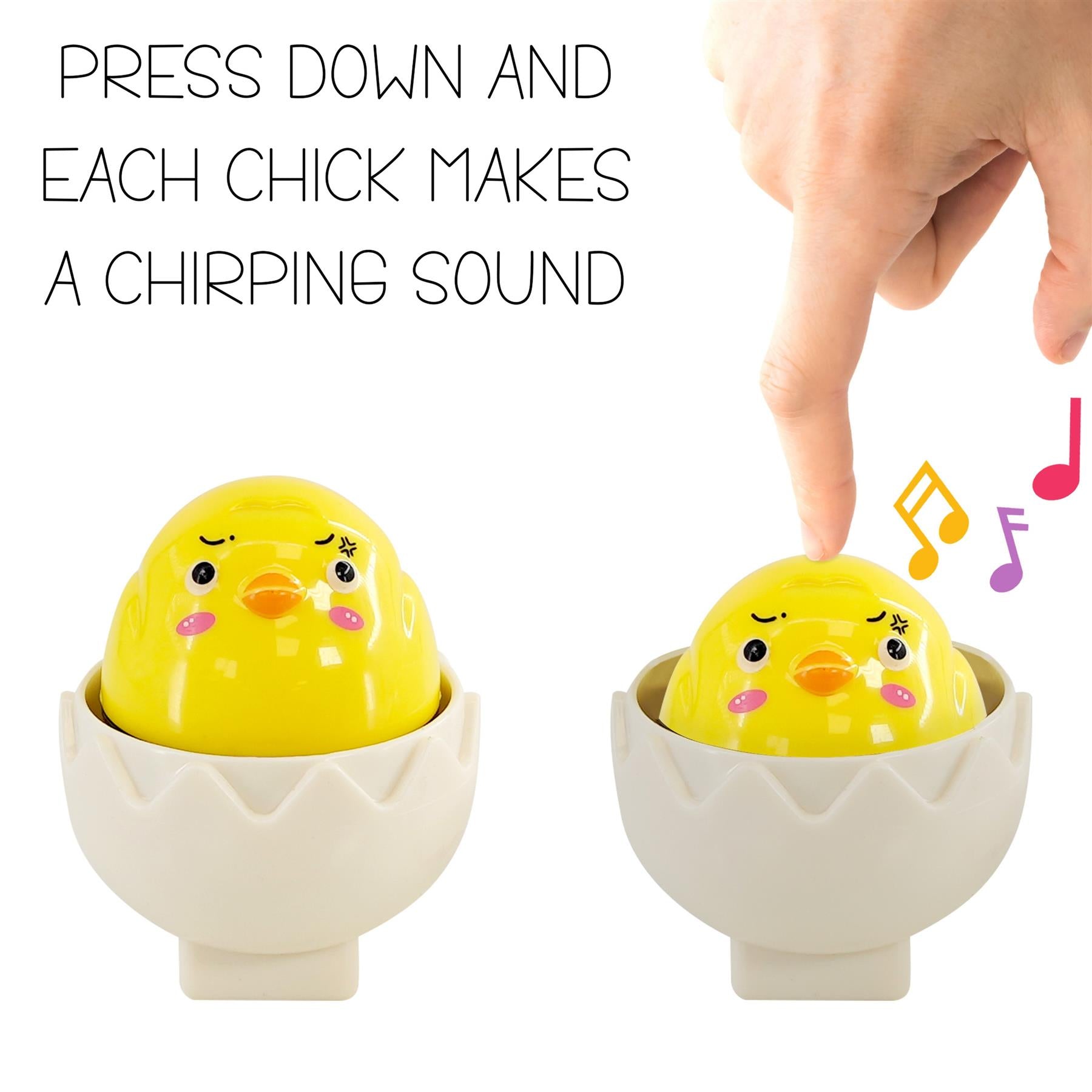 Two yellow chick toys are seated in white egg containers; a hand presses the right chick.