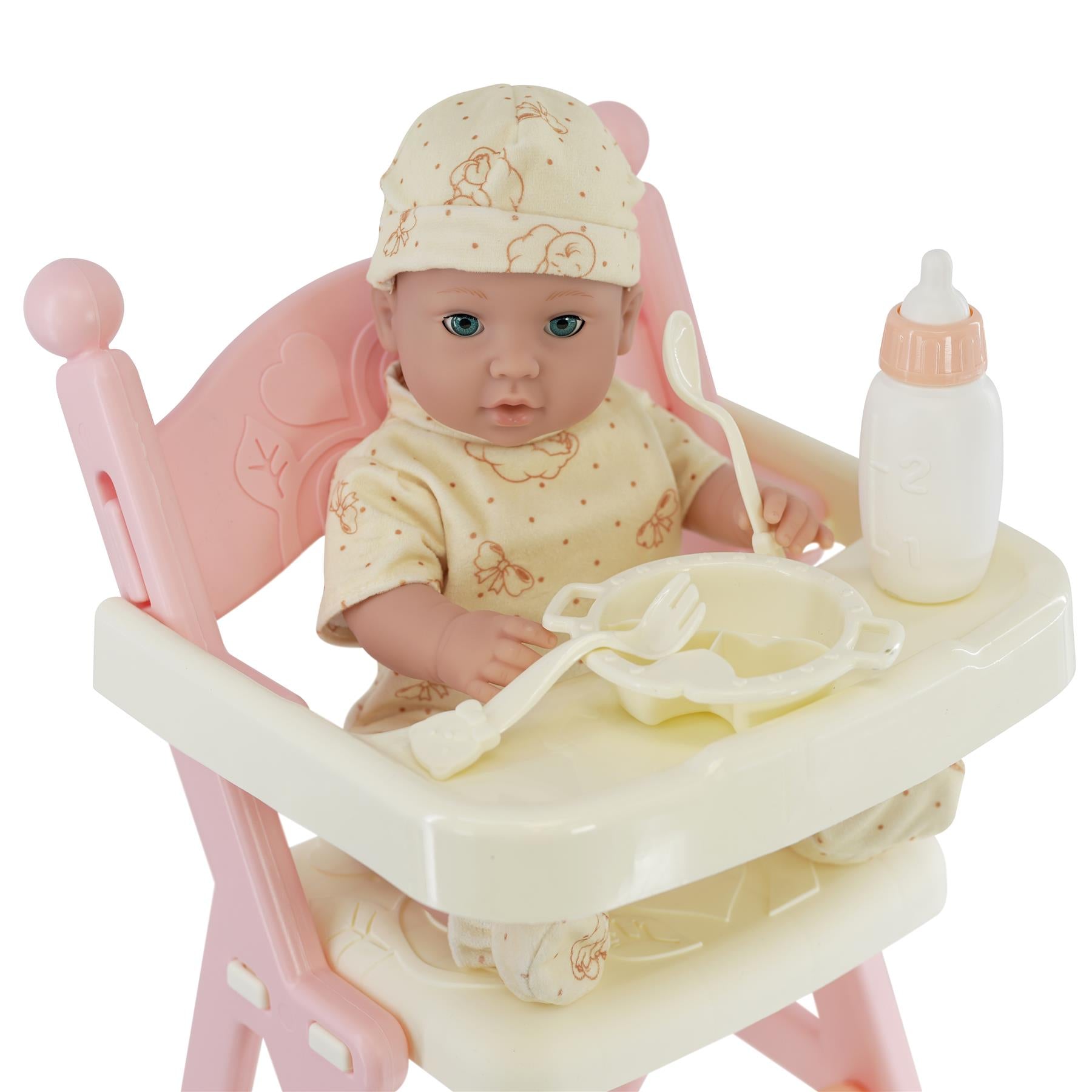 "A plastic baby doll sitting in a pink high chair, holding a spoon and bowl, next to a bottle." - The Magic Toy Shop
