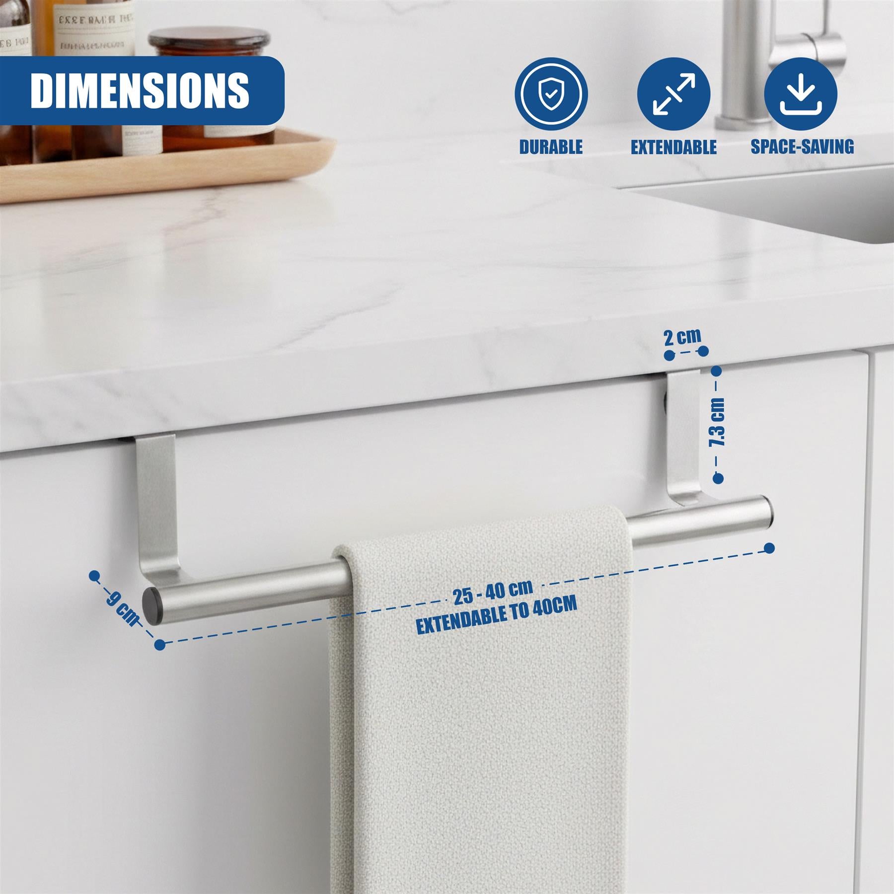 Silver metal rail for hanging towels, extending from nine centimeters to forty centimeters beneath a countertop.