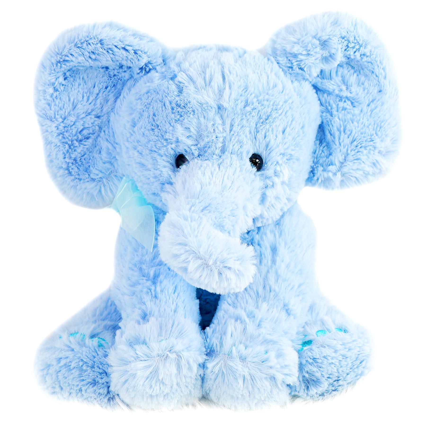 A soft, plush toy elephant with a light blue, fluffy body and a sweet, innocent expression. The elephant has a small, round head, a long, curved trunk, and a big, floppy ear. Its eyes are large and round, and its nose is small and rounded. The elephant is sitting on its ha... - The Magic Toy Shop