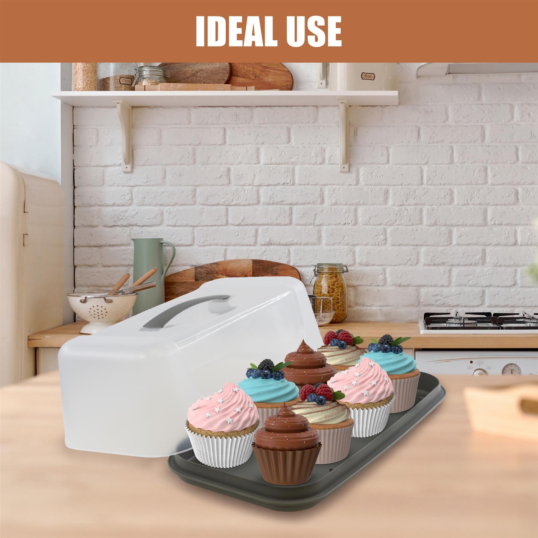 Rectangular white cake carrier resting on a gray tray containing multiple decorated cupcakes.