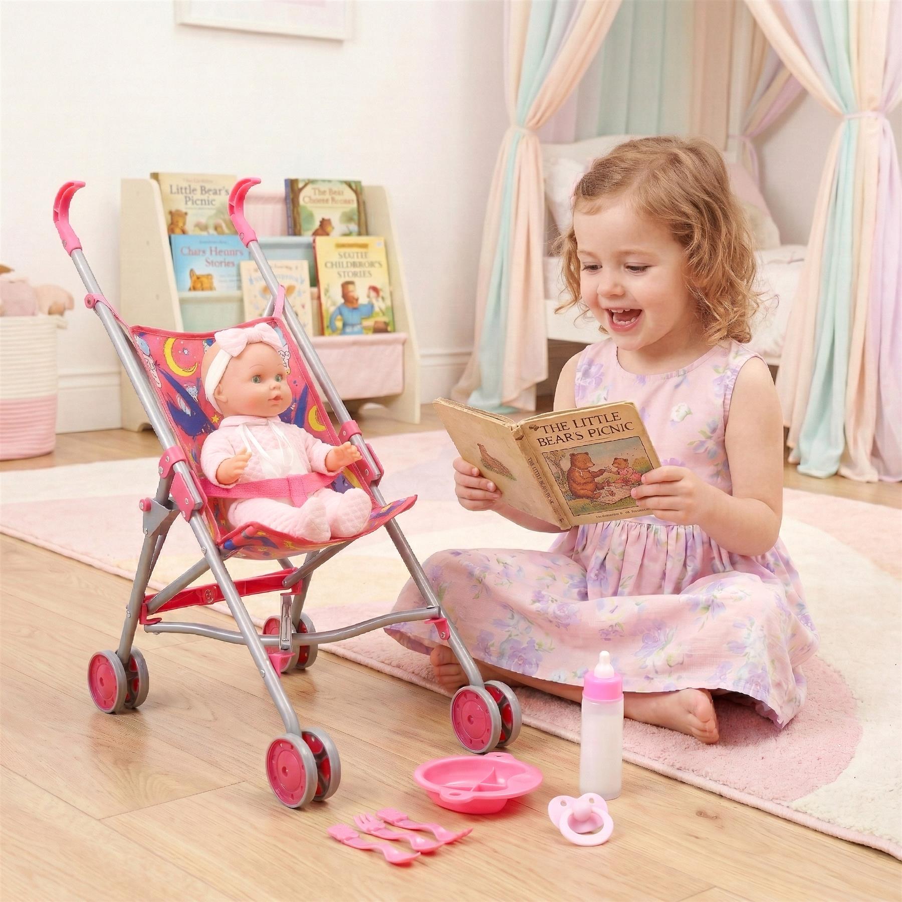 Little girl playing with a doll, stroller, book, and feeding set of toys.