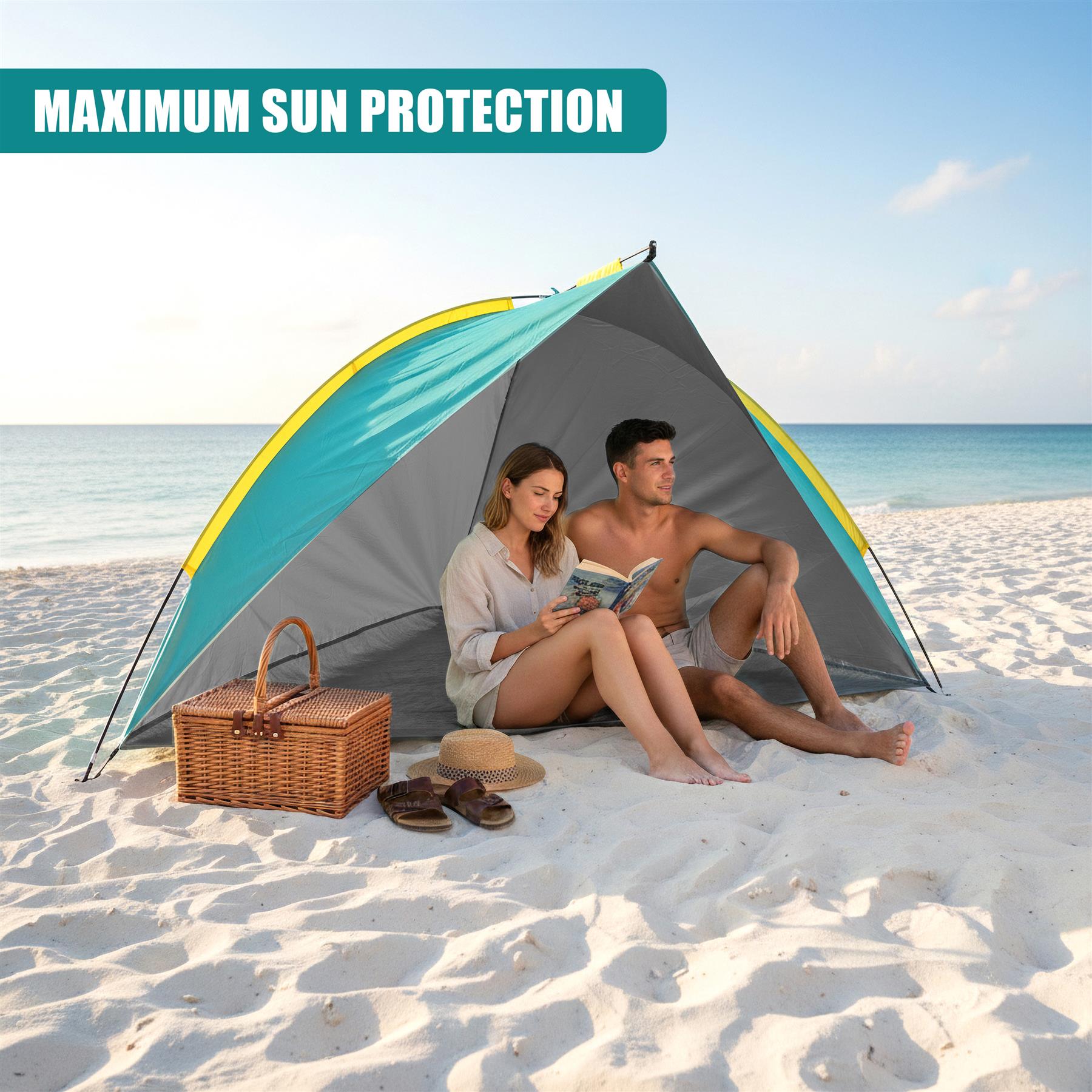 Two people sit in a beach tent on sand next to a woven basket and sandals.