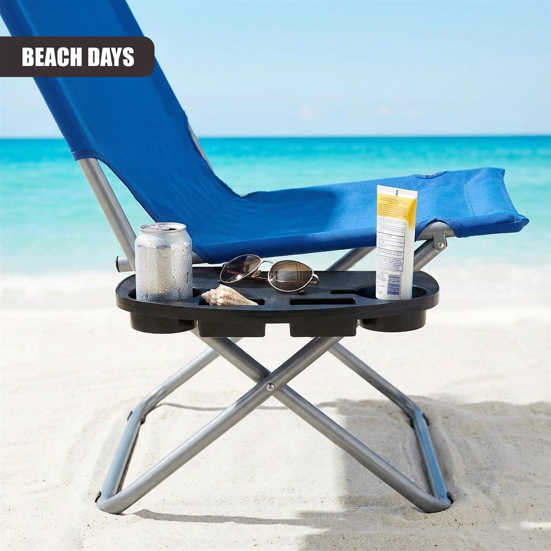 A portable, compact beach chair with a built-in tray for drinks and snacks, featuring a sturdy metal frame, adjustable back and armrests, and a durable, water-resistant fabric. The chair has a built-in cup holder and a tray for holding food and drinks, making it a convenient and comfortable option for beach or outdoor use. - The Magic Toy Shop