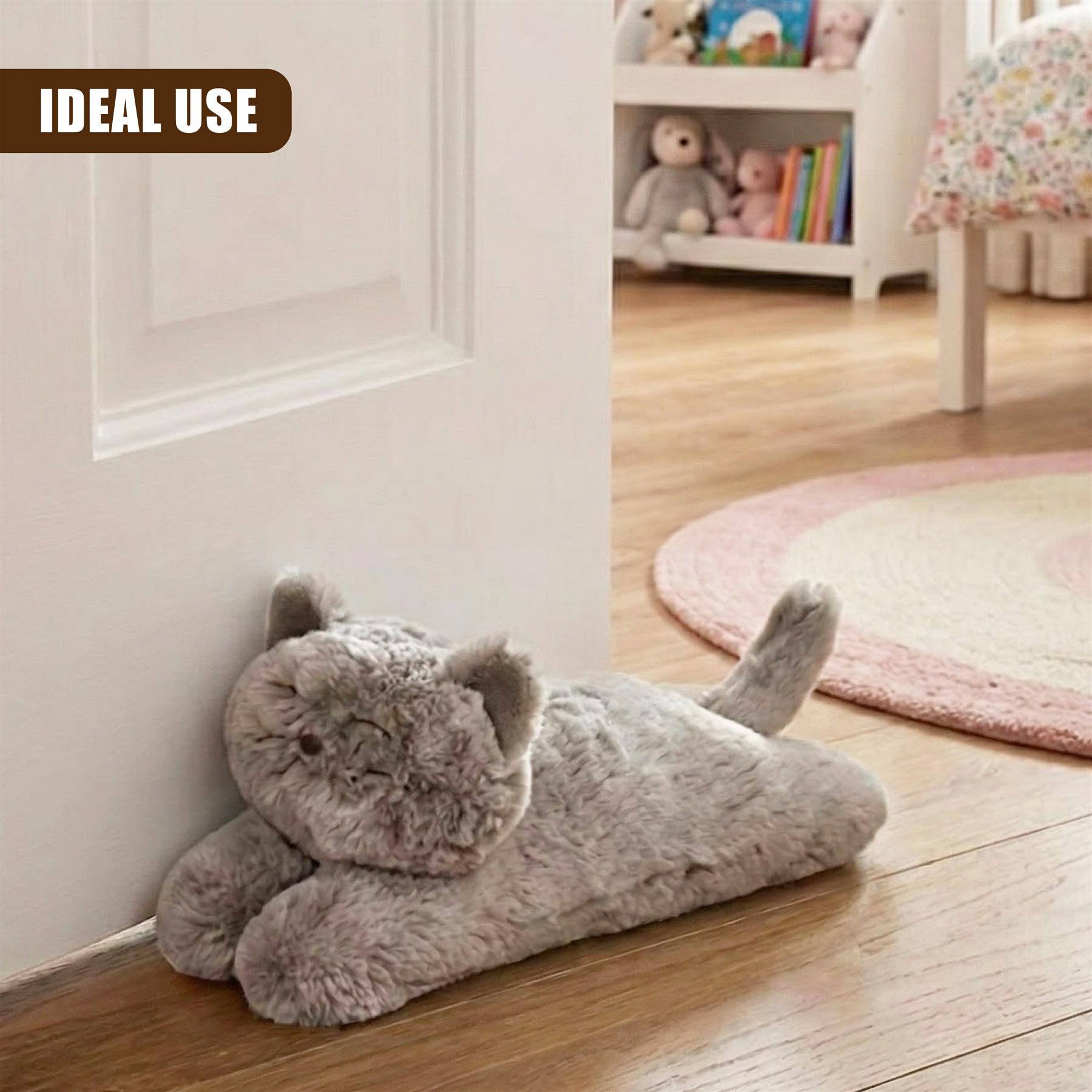 "Adorable gray cat toy on floor, leaning against wall in hallway" - The Magic Toy Shop
