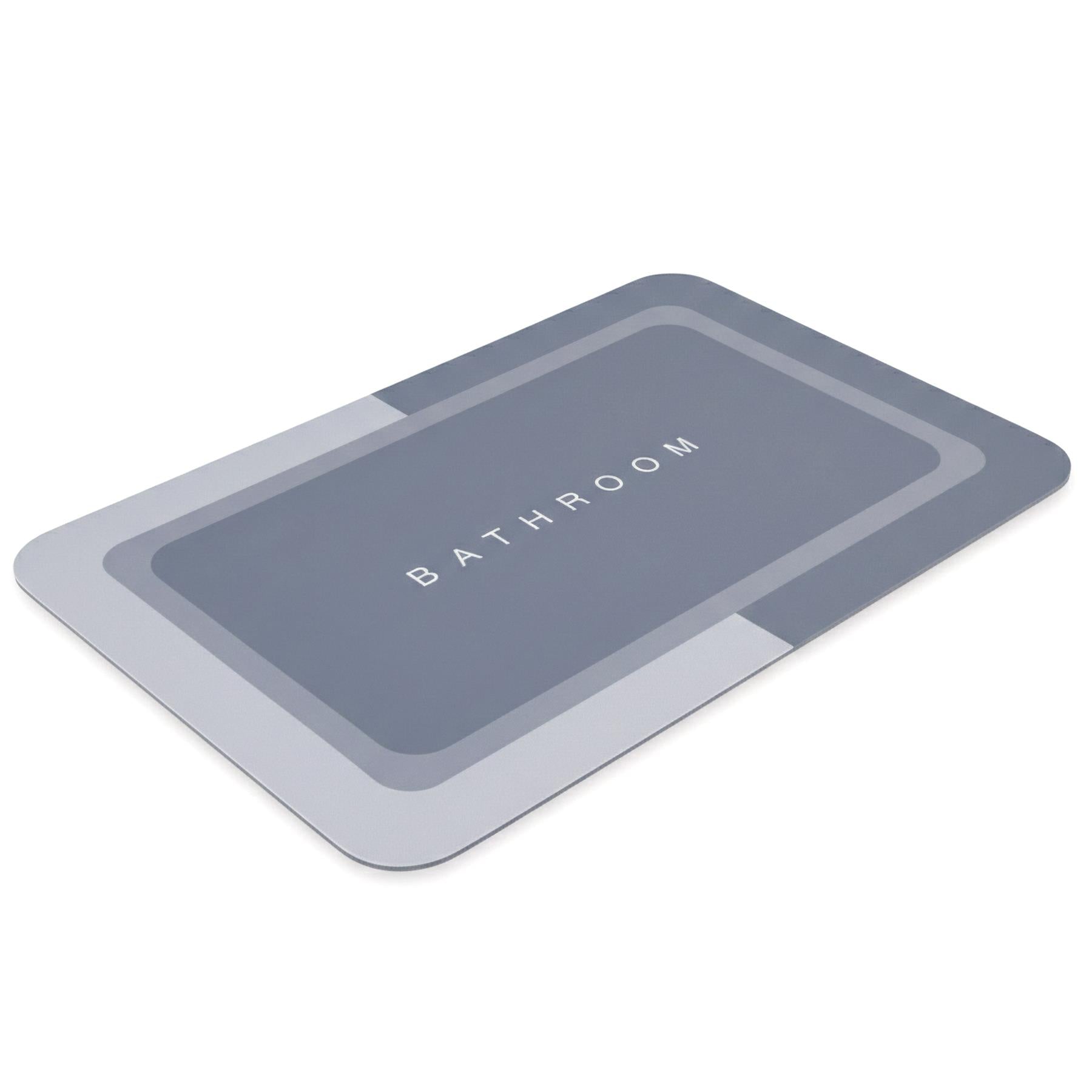 Rectangular anti-slip mat featuring layered gray and blue tones with the word "BATHROOM" printed in the center.
