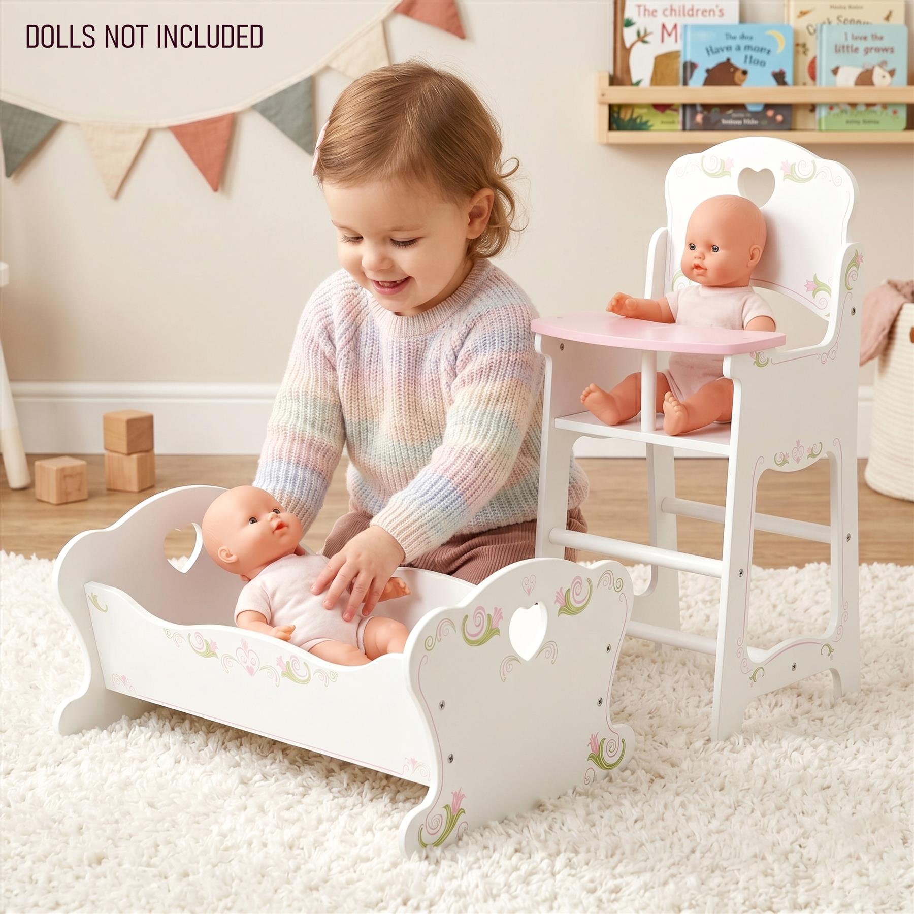 White wooden doll cradle and matching high chair set displayed together.