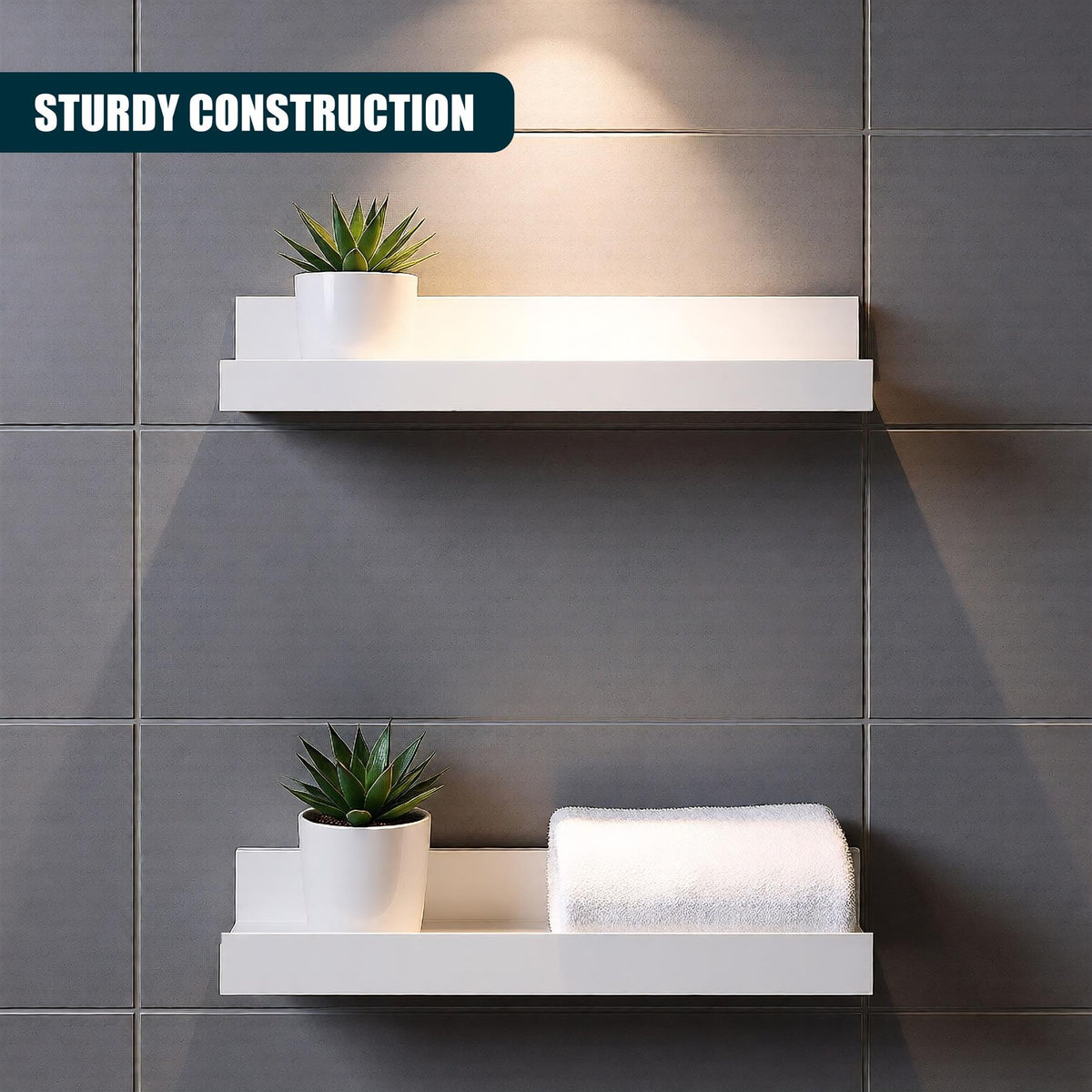 White floating shelves, a set of two, displayed on a tiled wall with plants and a towel