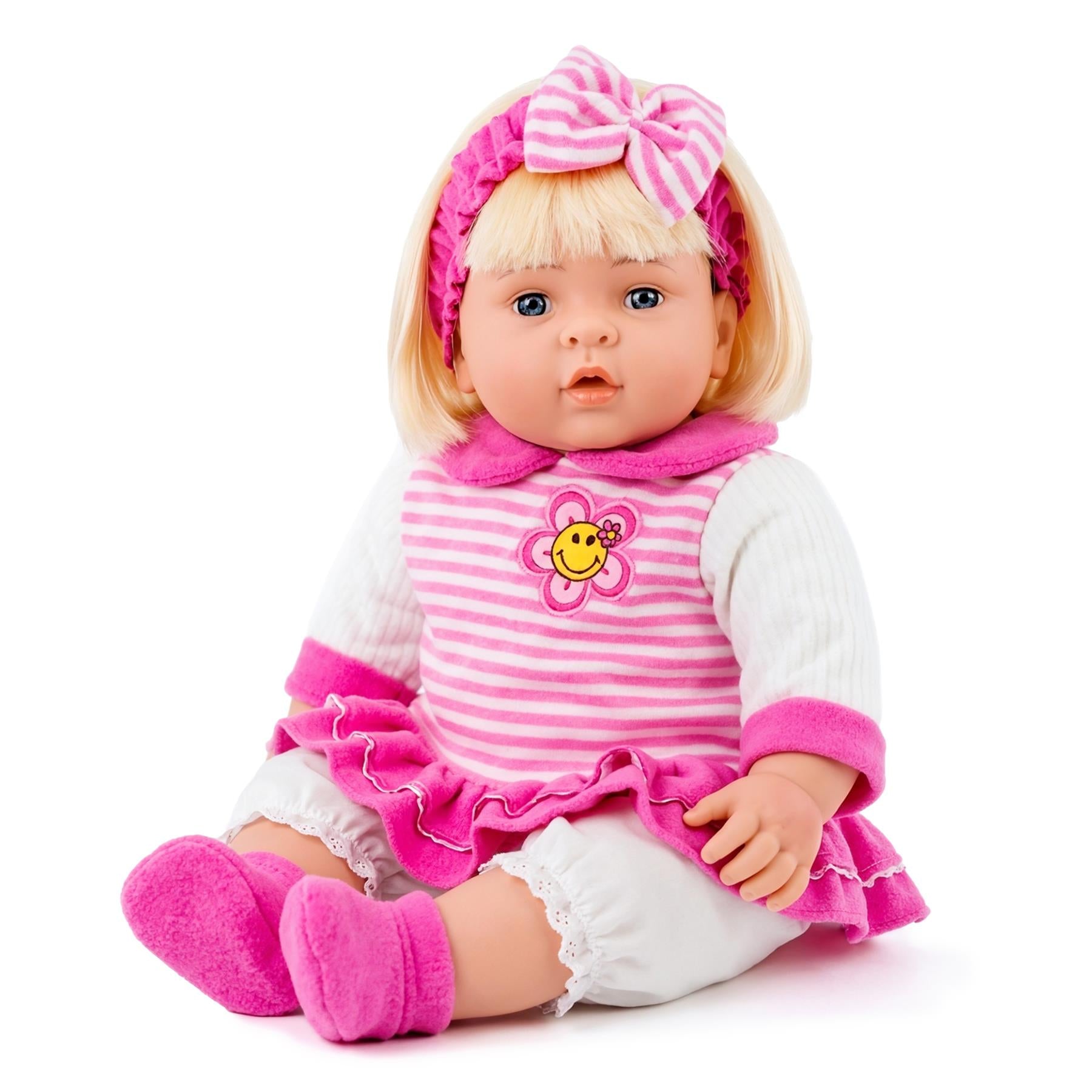 Large chubby baby doll with blonde hair, wearing a pink outfit on its body.