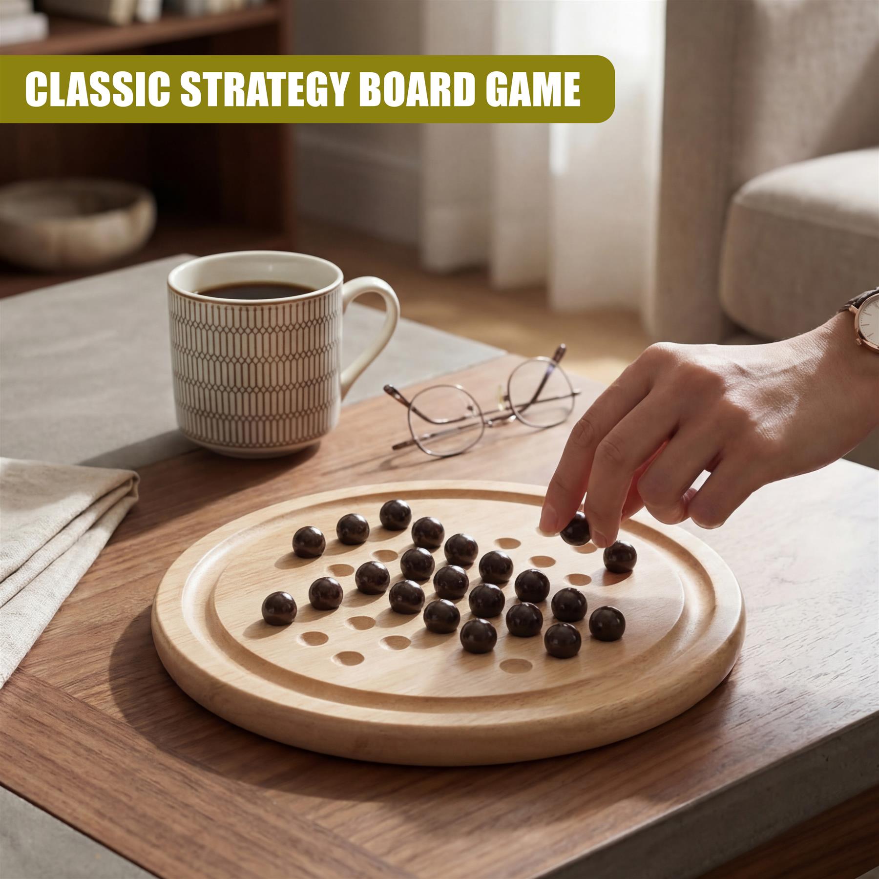 Wooden solitaire game board showing arranged black tokens, with a hand placing a token.