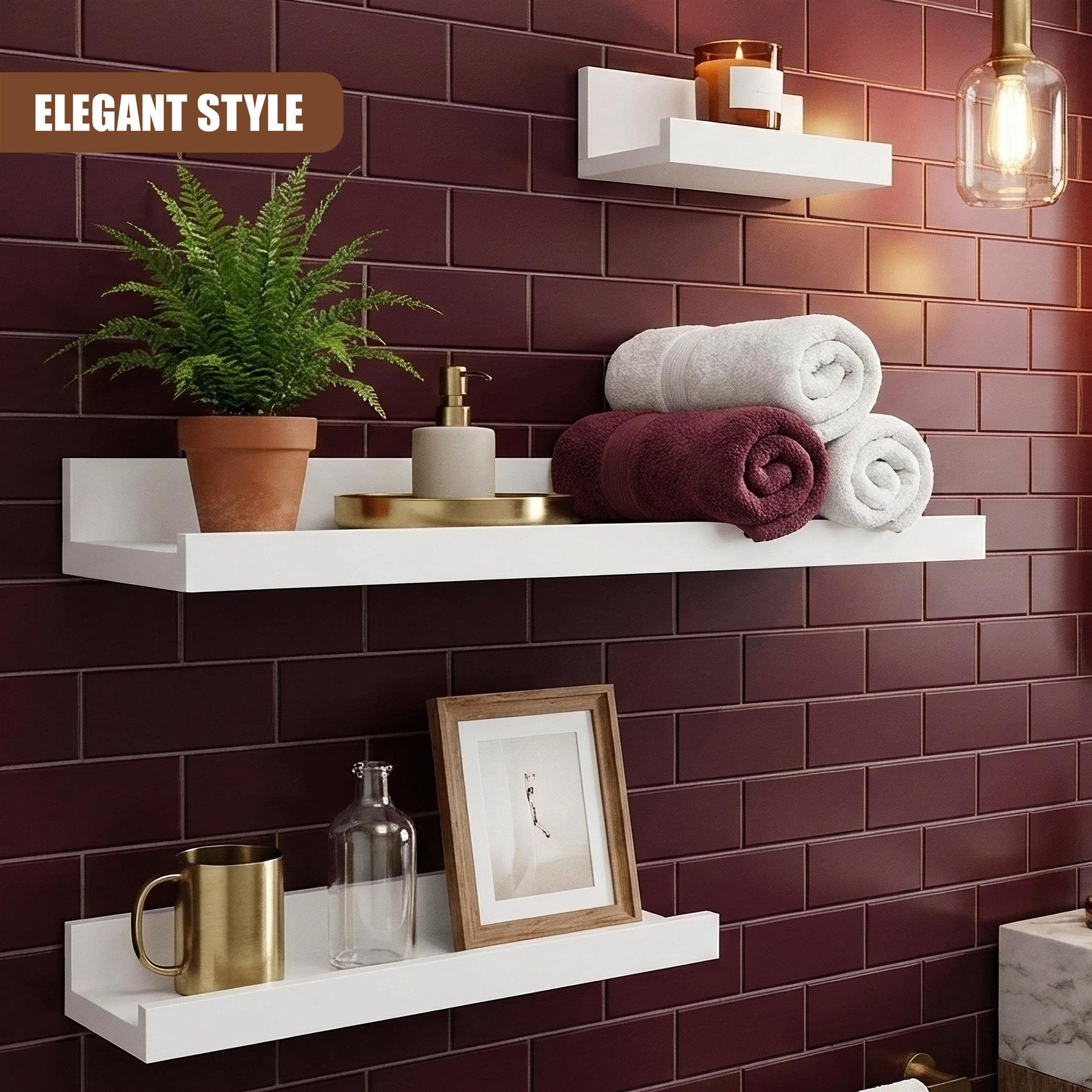 A white, floating shelf with a minimalist design, ideal for storing and displaying small items in a bathroom or kitchen. The shelf features a flat, smooth surface and a sturdy design, making it suitable for holding a variety of items, from bathroom essentials to kitchenware. - The Magic Toy Shop