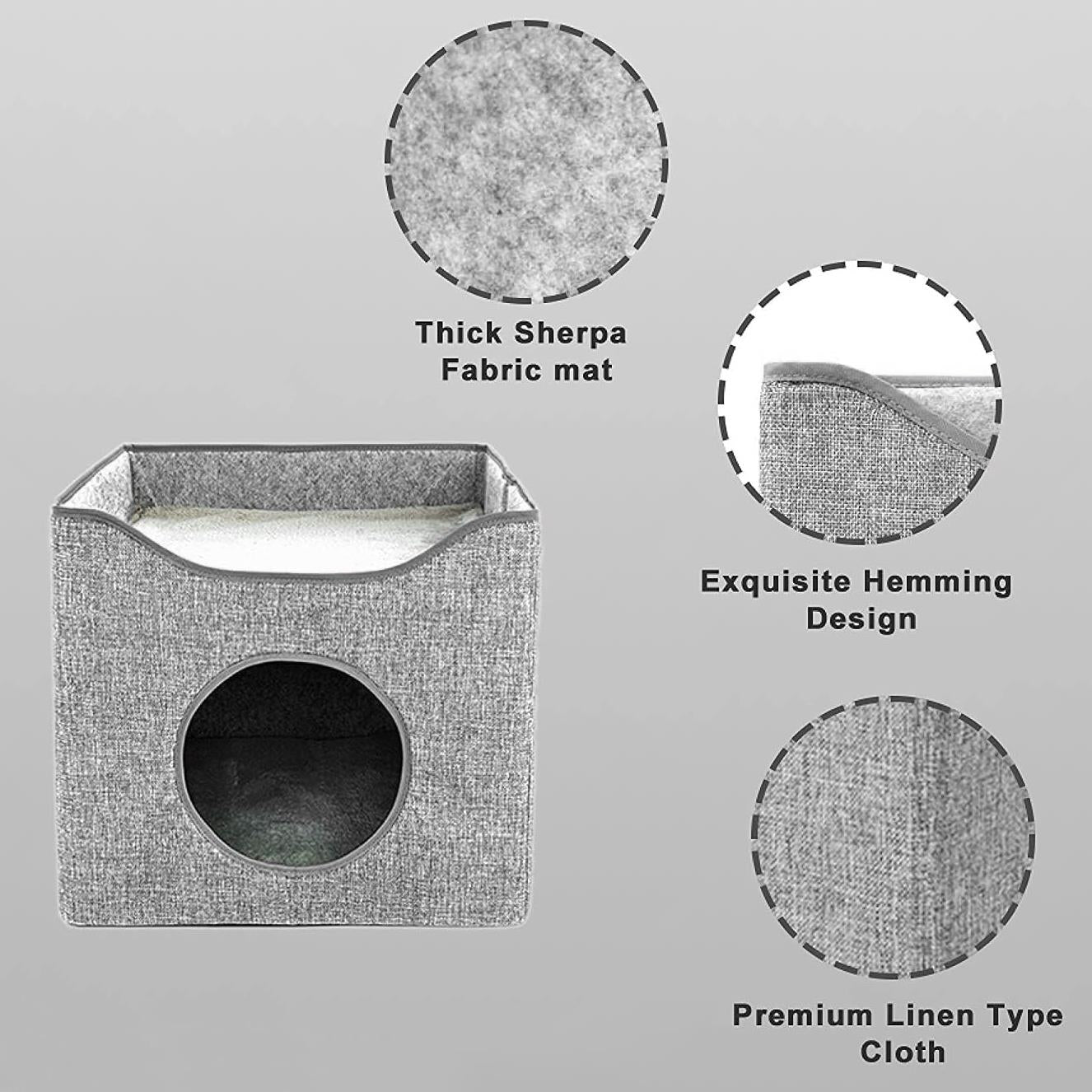 A grey cat bed with a hole in the front, made of thick, soft fabric. It has a high, wide, and deep design, with a sturdy construction. The bed is made of a thick, soft, and durable fabric, and has a strong, stable, and durable construction. It is suitable for cats of all sizes and is designed to provide a comfortable and safe place for them to rest. - The Magic Toy Shop