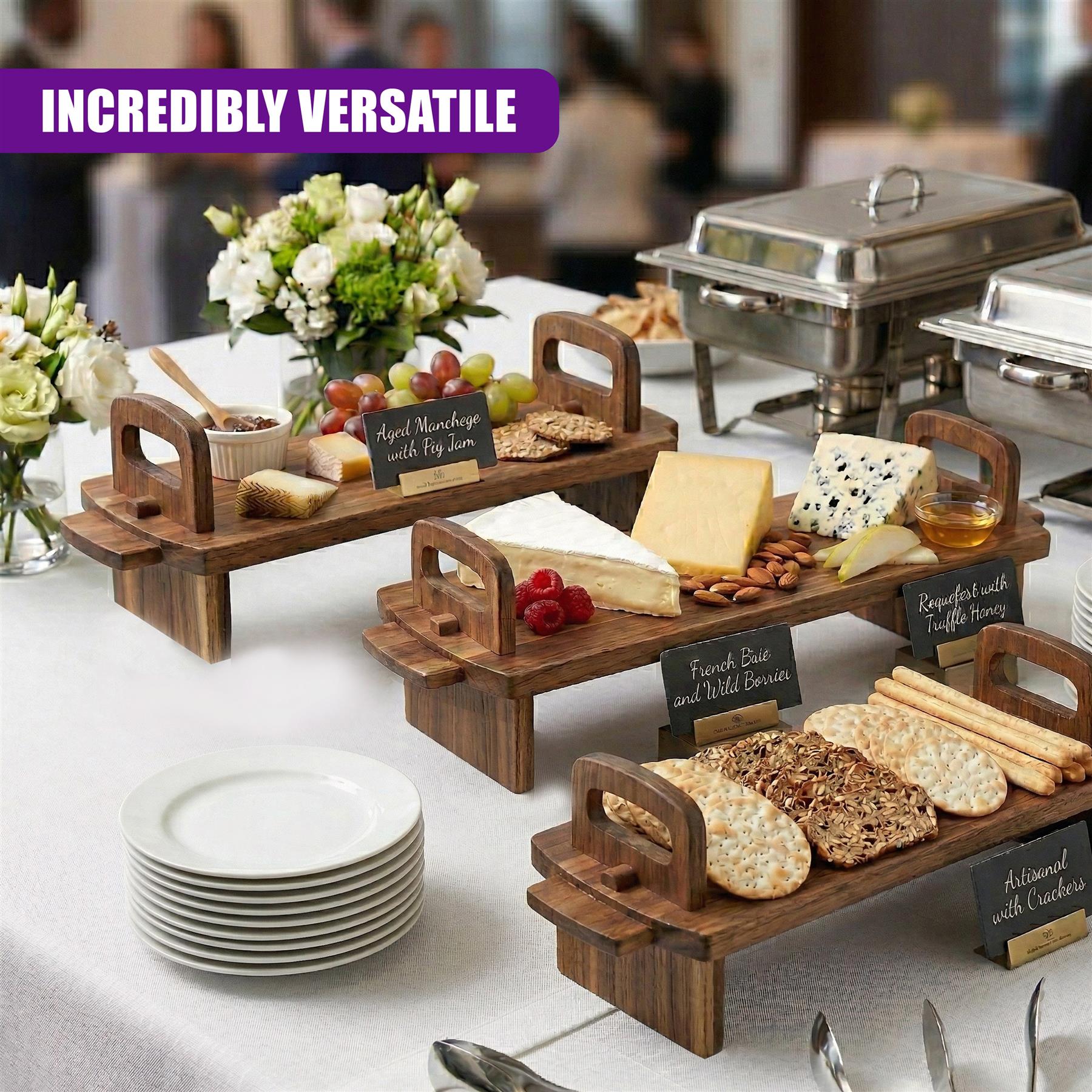 Multiple wooden serving platters display cheeses, fruits, crackers, and assorted breads.