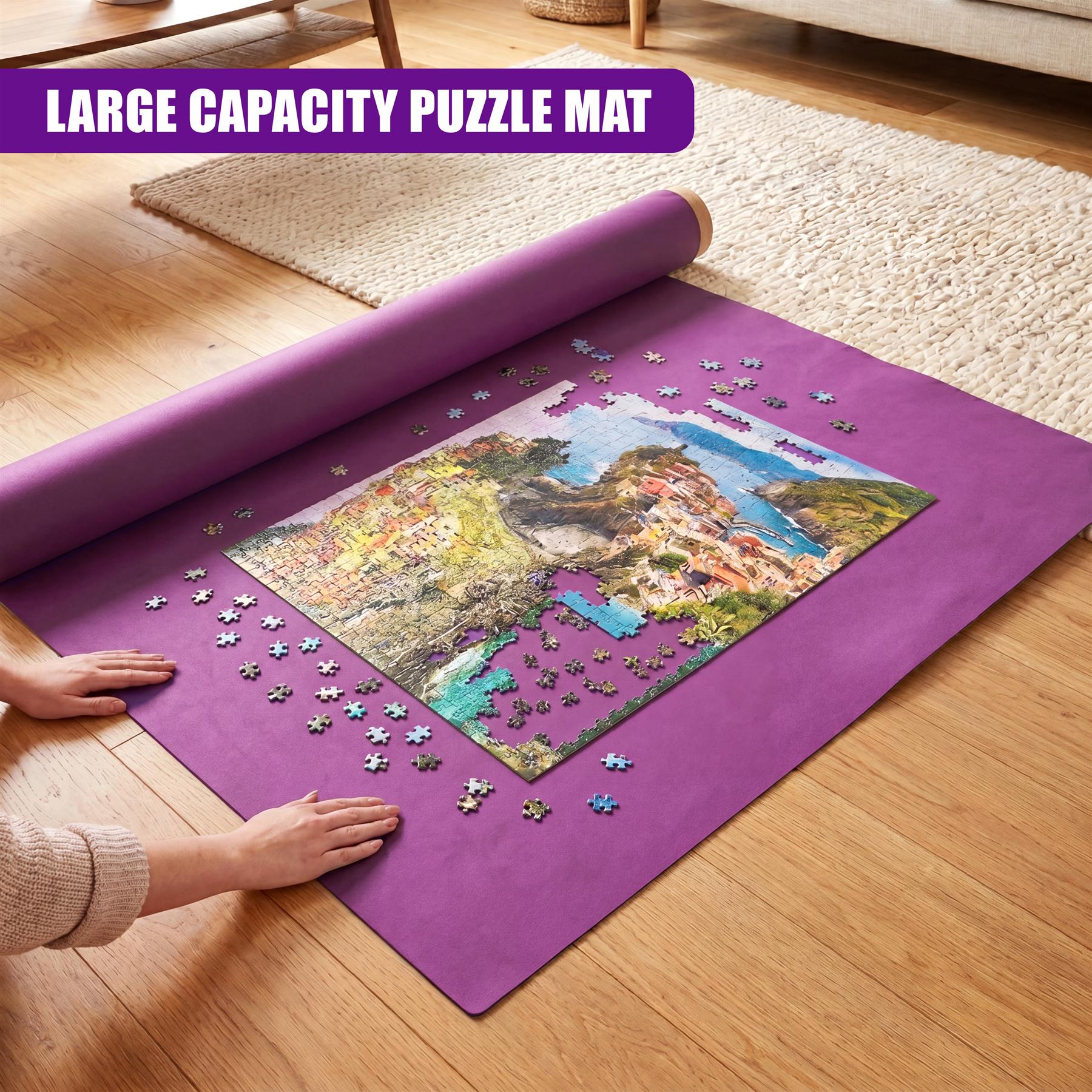 Unrolled purple puzzle mat featuring a vibrant landscape design laid on a hardwood floor.