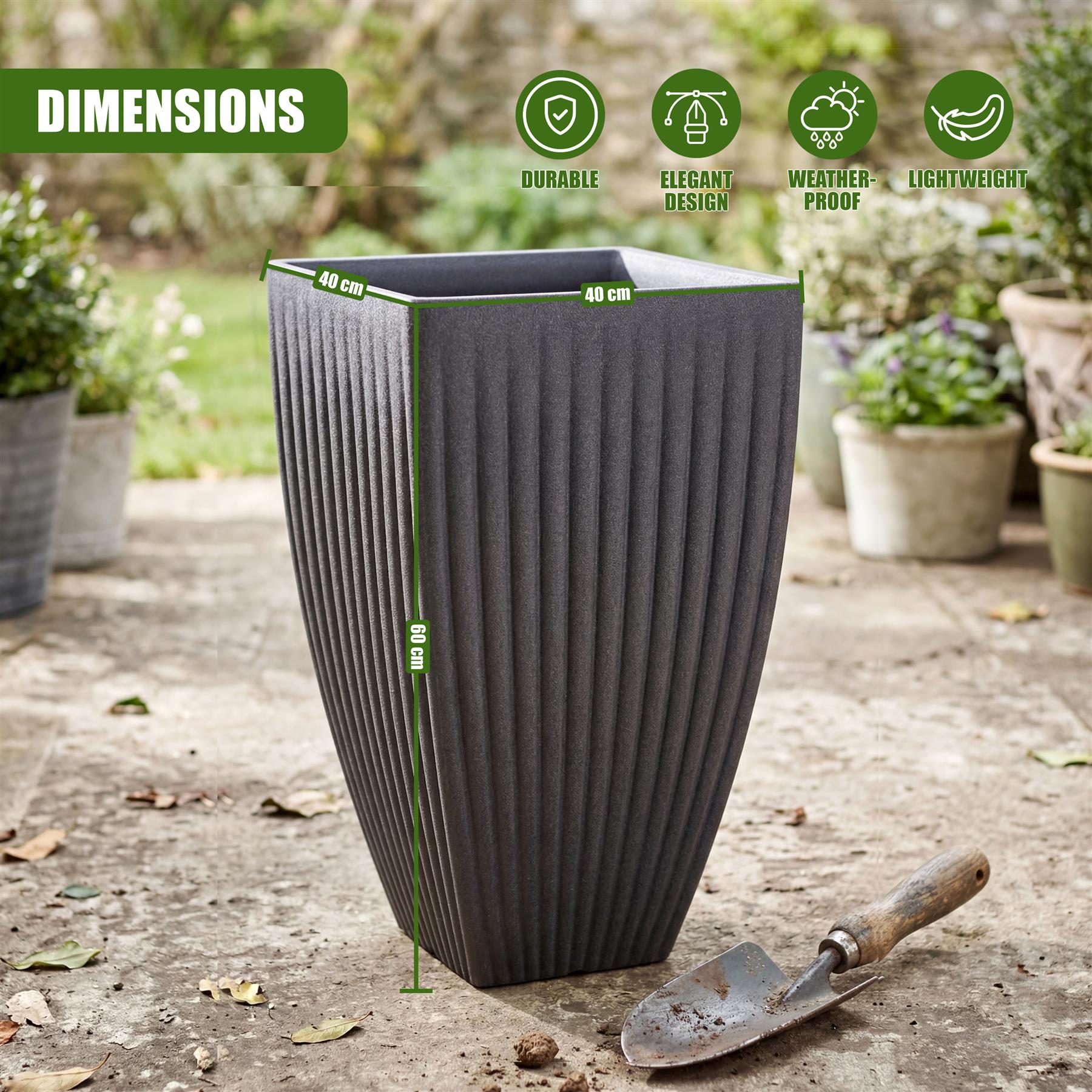 Tall, gray, fluted square planter pot shown with dimensions markings and a small shovel on concrete.