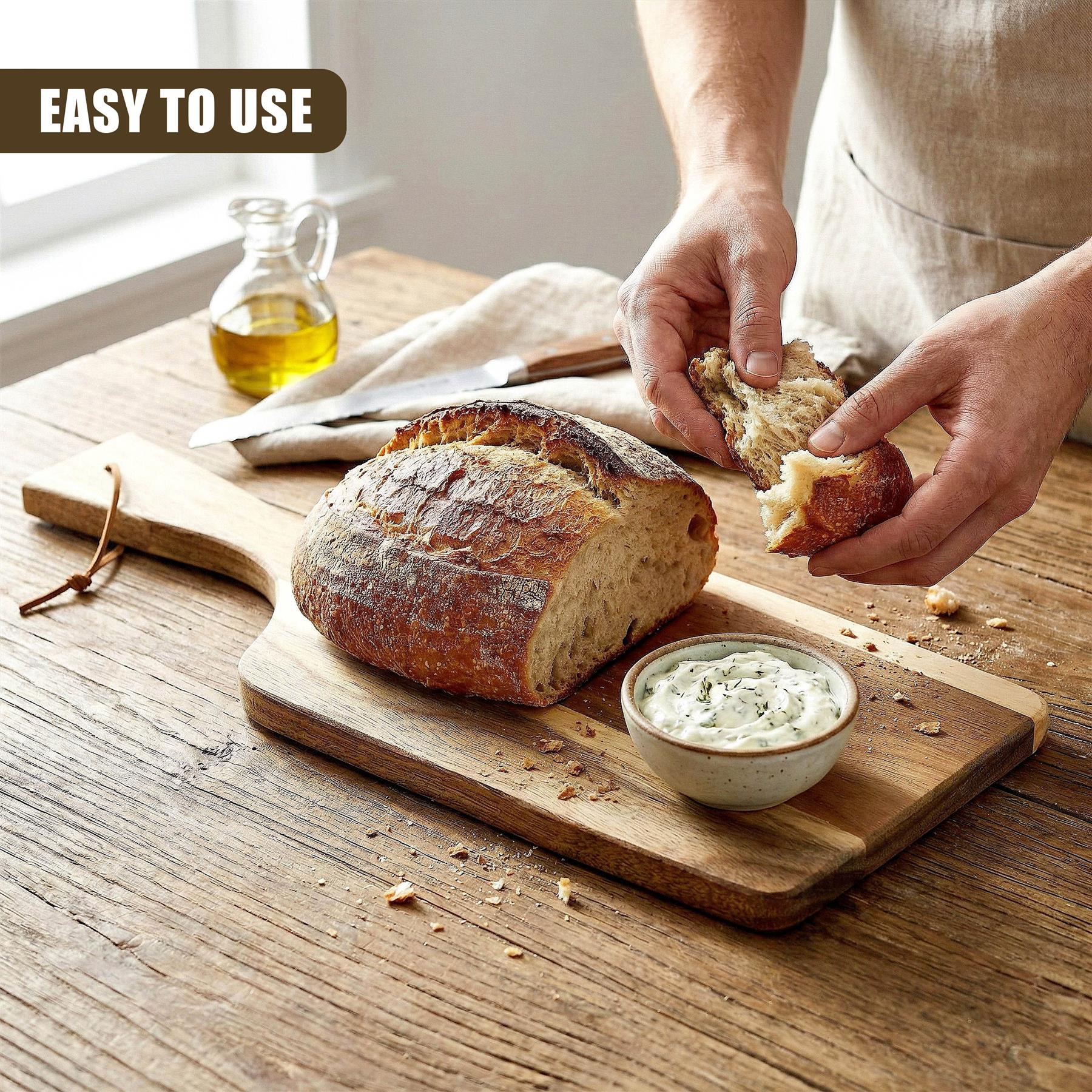 A rustic wooden paddle board displays sliced bread and a small bowl of spread dip.