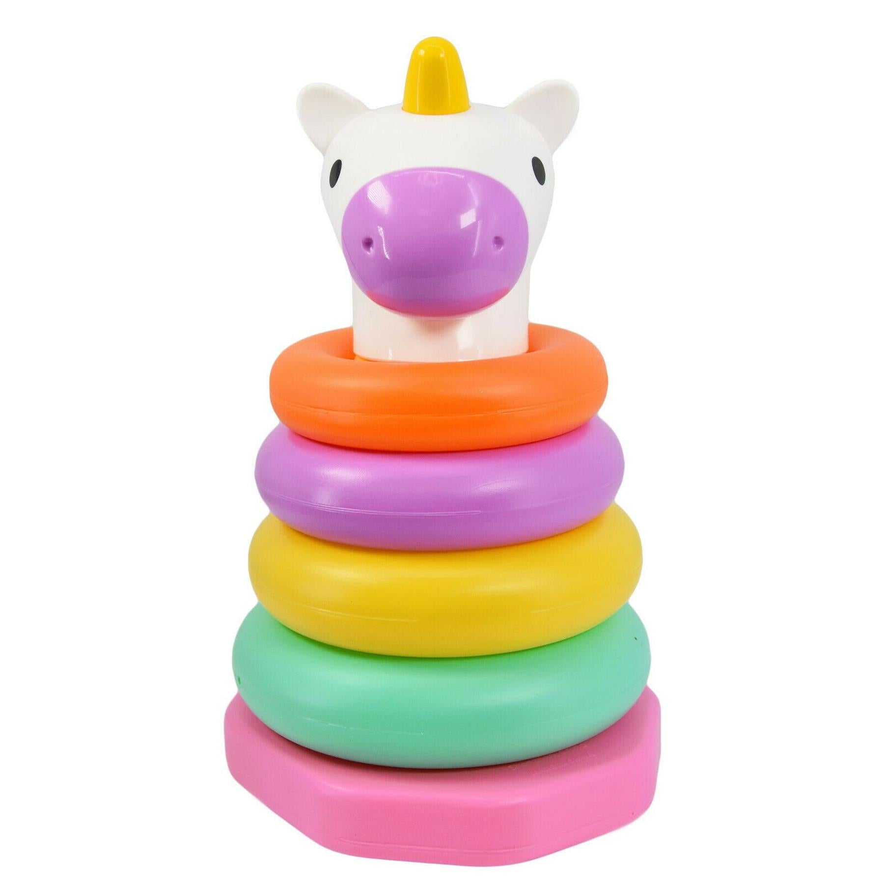 White animal head with yellow horn sits atop a stack of five colorful plastic rings.