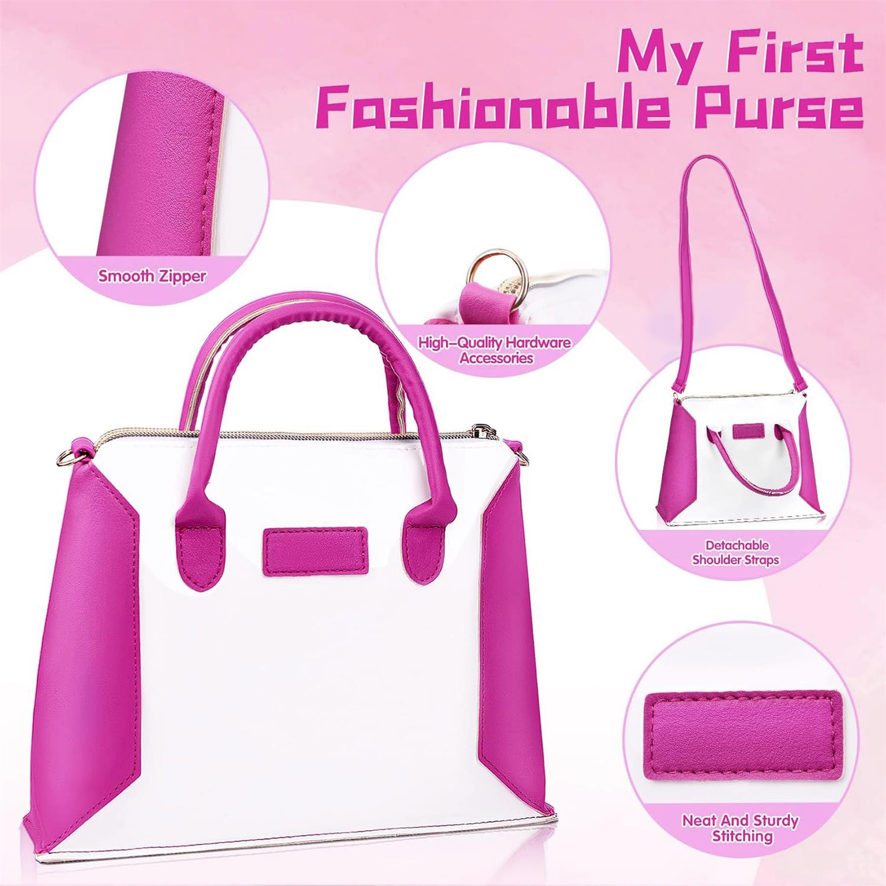White and pink toy handbag featuring zippered sections, a carrying handle, and detachable shoulder straps.