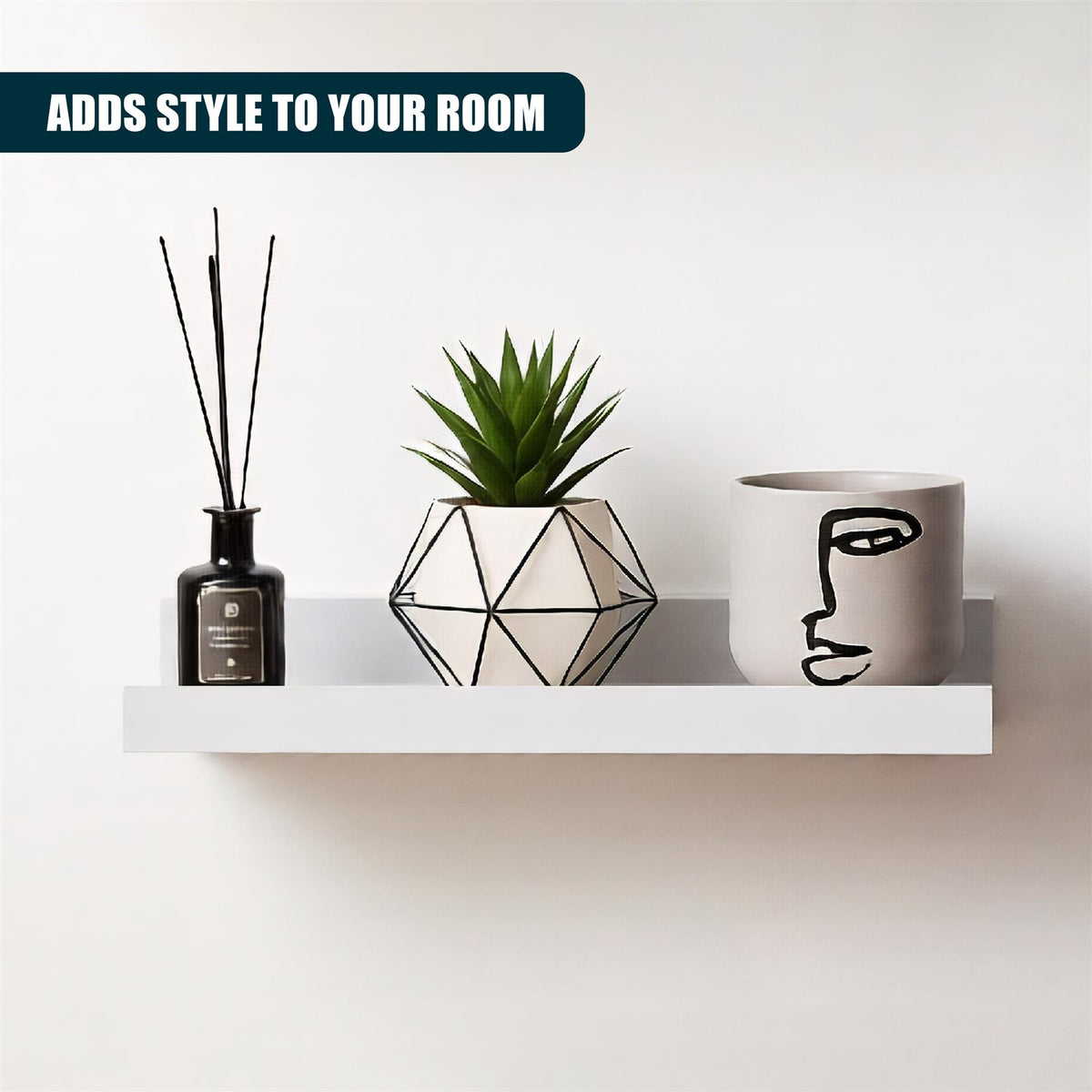 White floating shelves with décor – a set of two GEEZY shelves display a plant, candle and face print