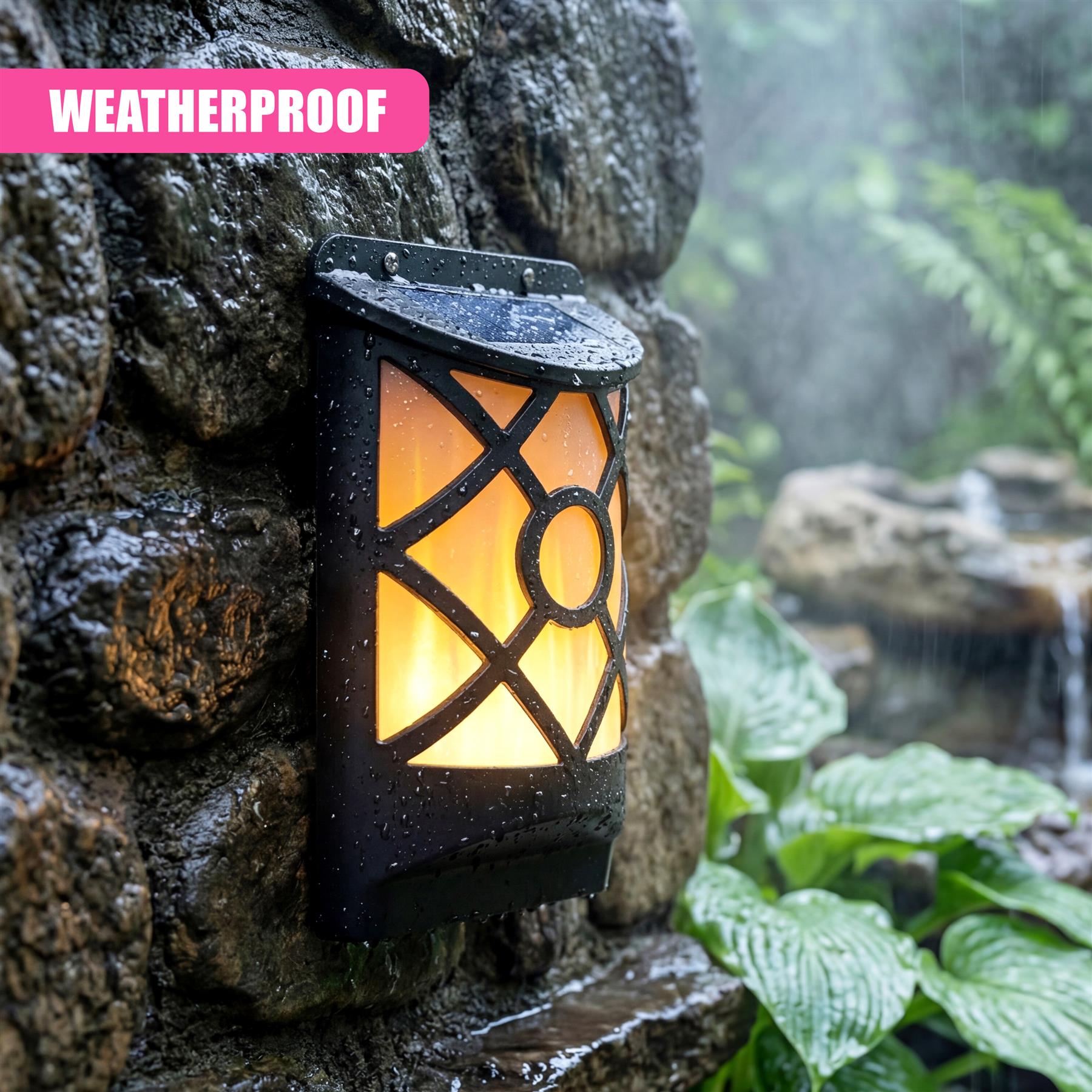 Black, decorative lantern attached to a stone wall features a glowing, patterned window.