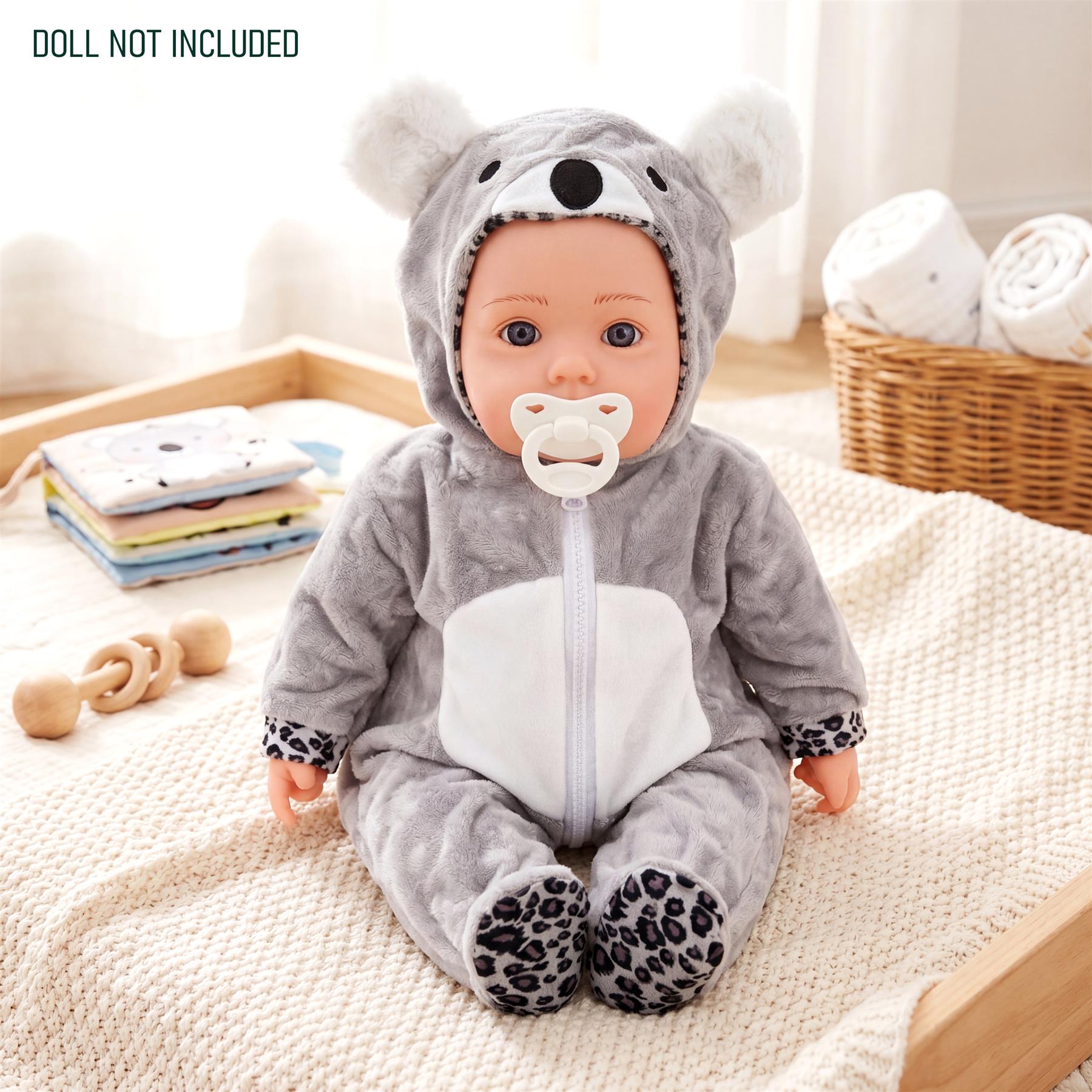 Gray hooded jumpsuit for a doll, detailed with bear ears and leopard-print cuffs.