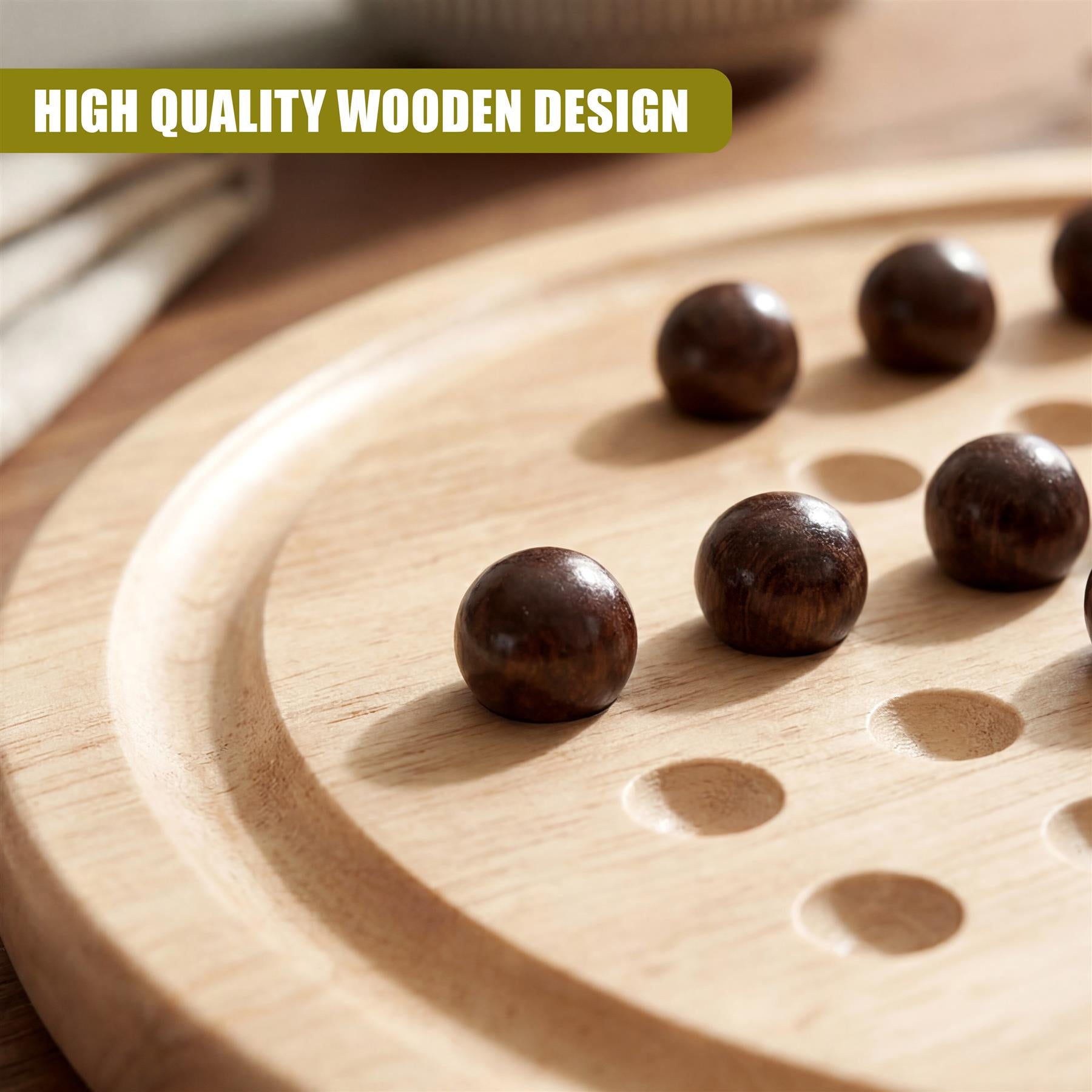 A light wooden board game surface holds several scattered dark wooden tokens.