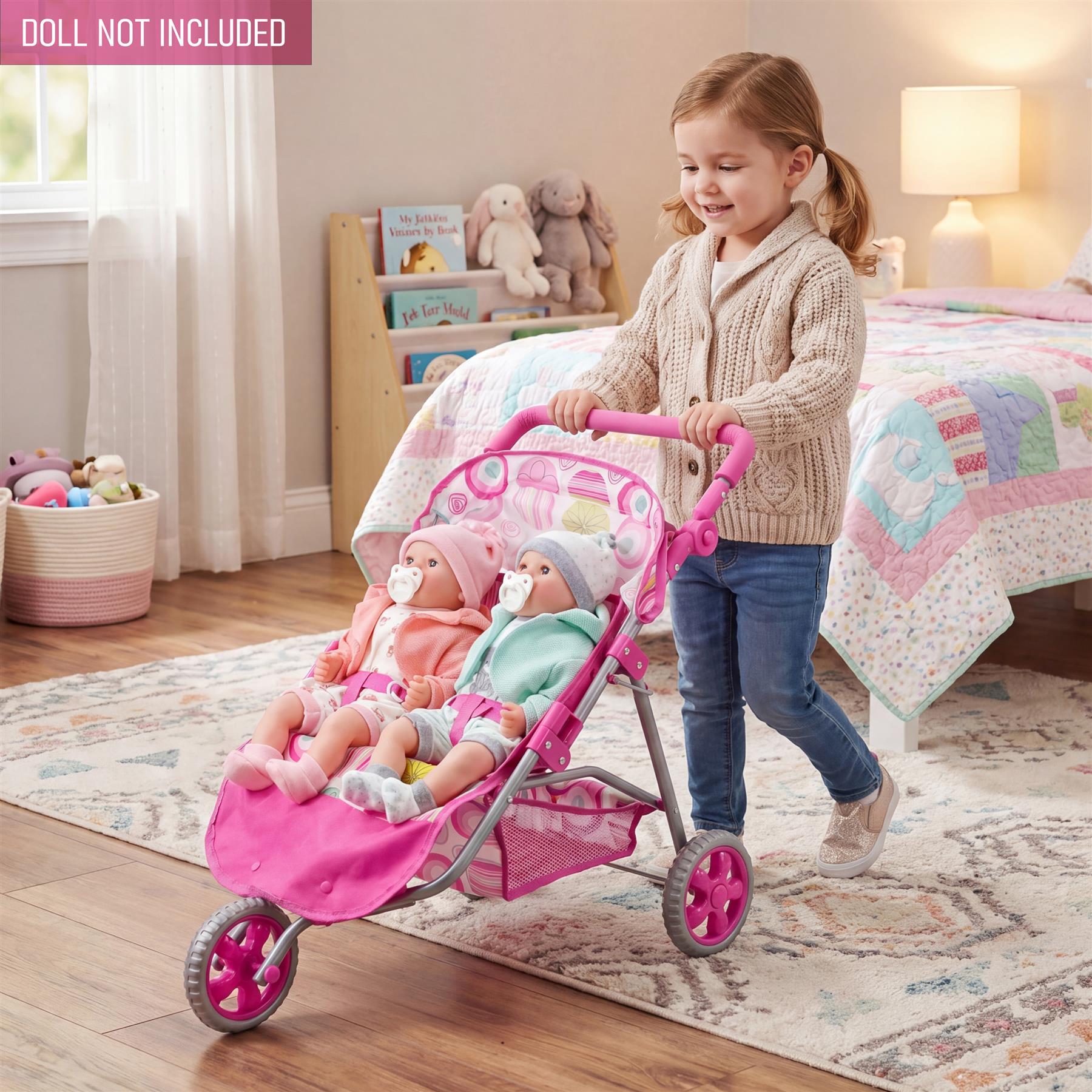 A pink doll stroller designed to accommodate two figures and featuring three visible wheels.