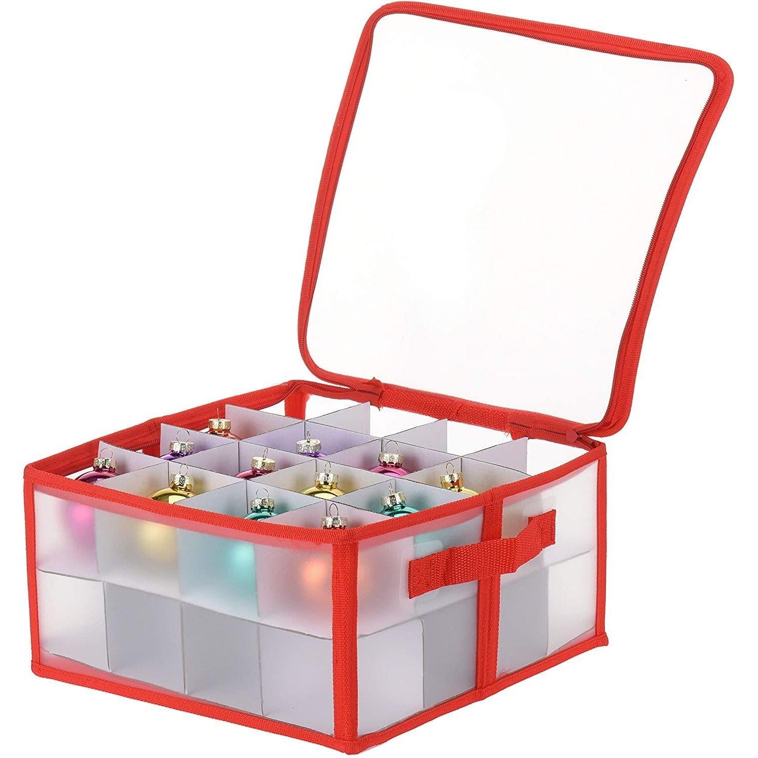 A red storage container with a transparent plastic front, containing 12 Christmas ornaments, each in a separate compartment. The container has a red handle and a hinged lid. - The Magic Toy Shop