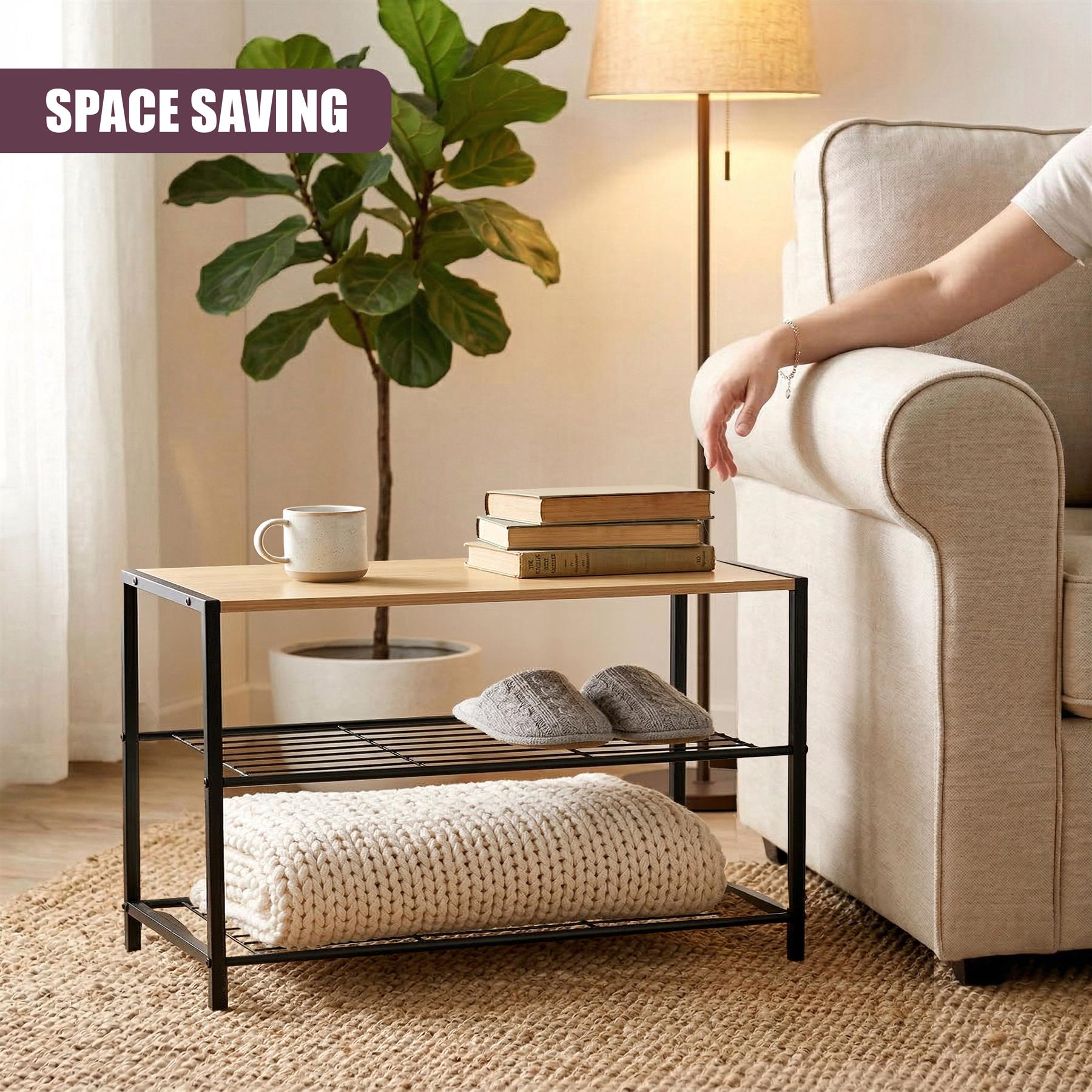Black two-tier shoe rack with wood top and metal frame, holding shoes and books.