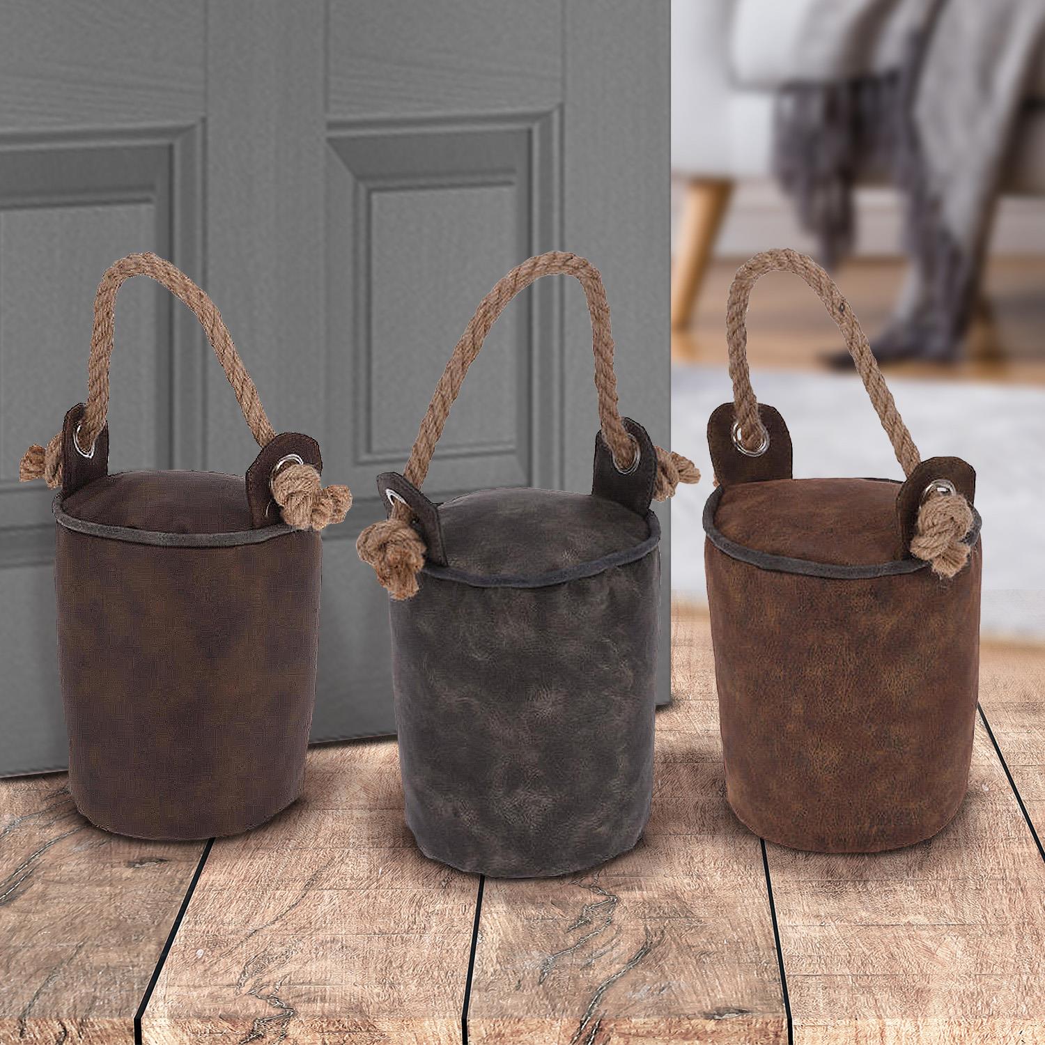 A set of three rustic leather storage baskets with handles, featuring a distressed finish, natural jute ropes, and a small, round, leather-covered lid. - The Magic Toy Shop