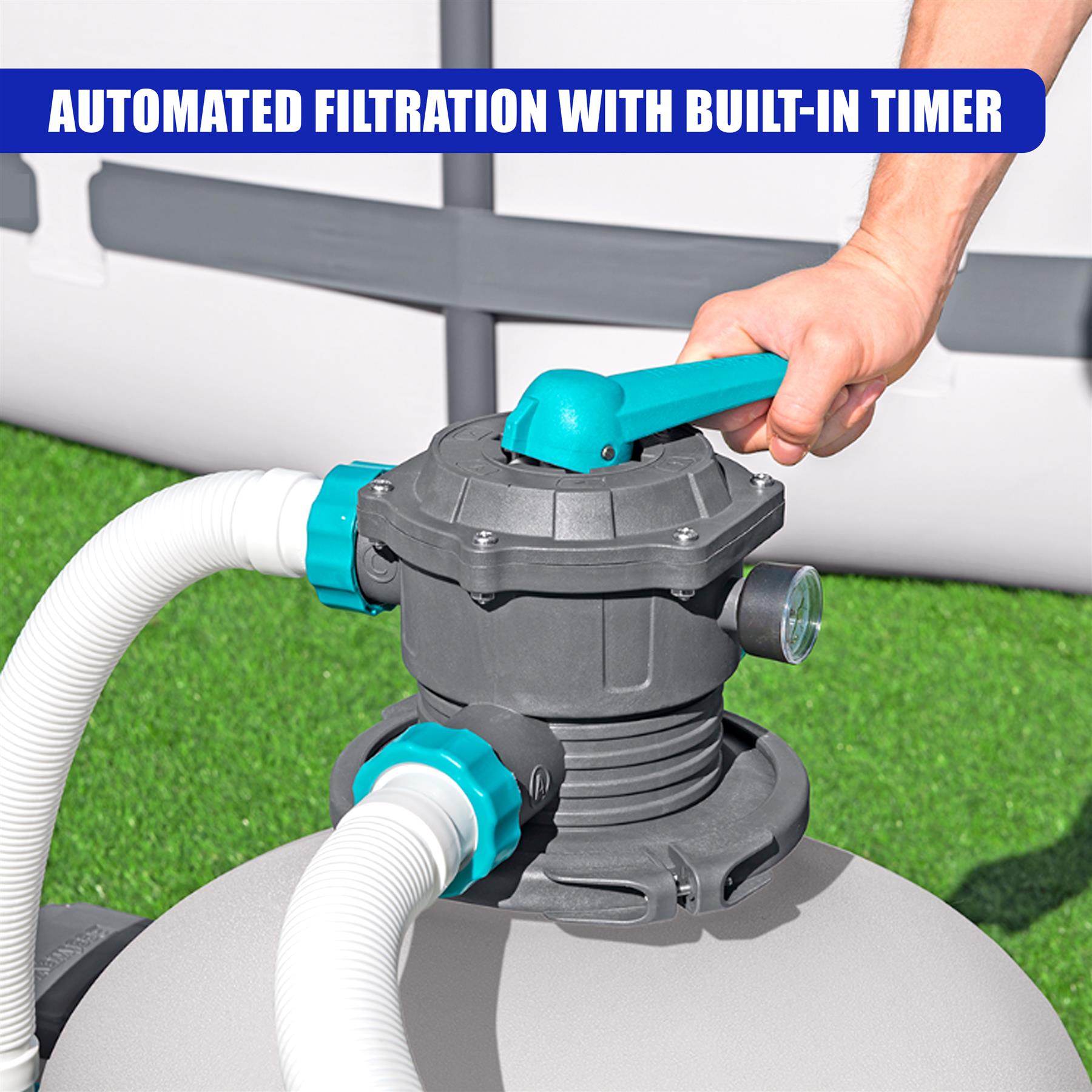 Gray filter system unit with connecting pipes and a visible blue manual control lever.